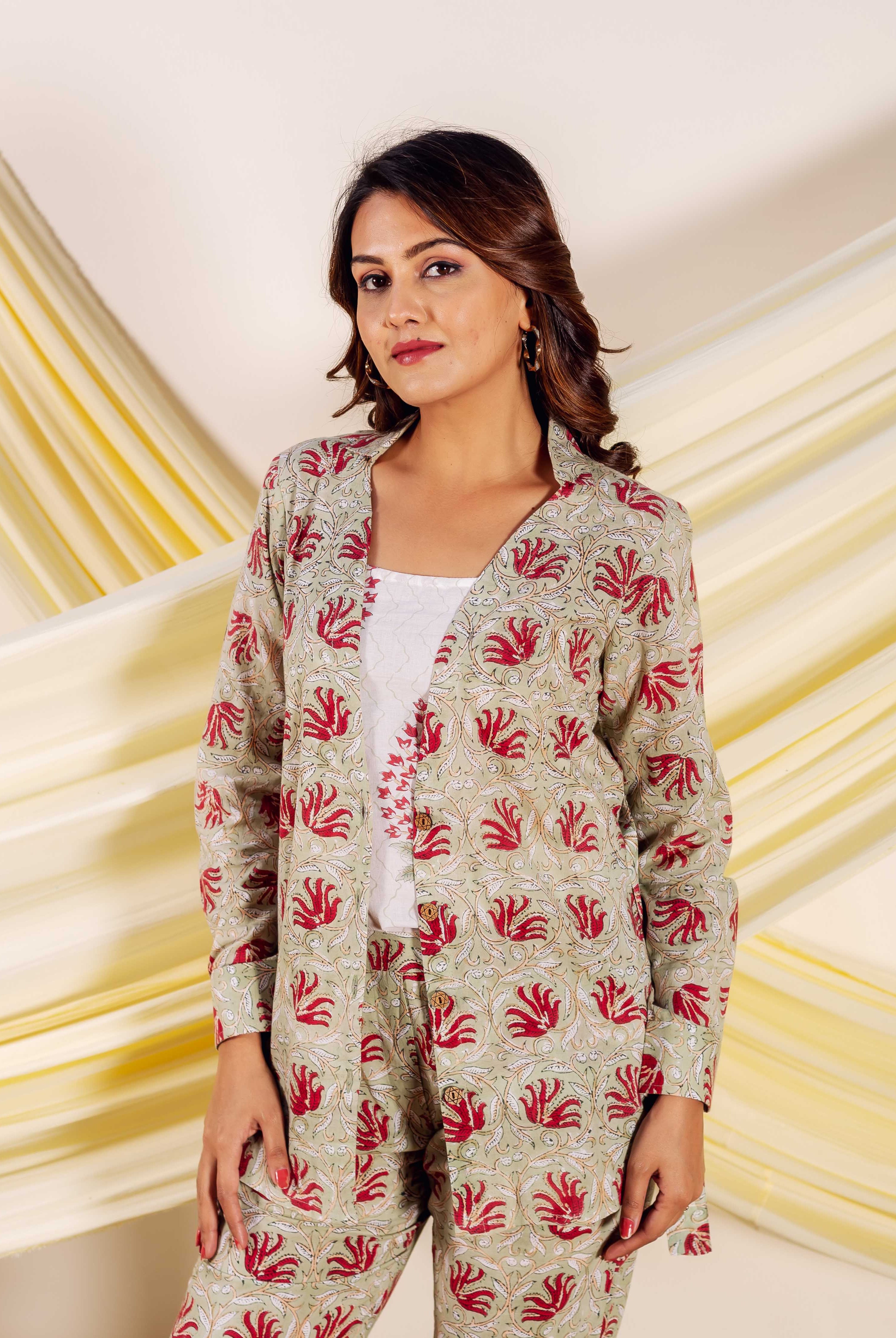 Model in light green hand-block printed Sophiya Co-ord Set with red ethnic floral motifs.