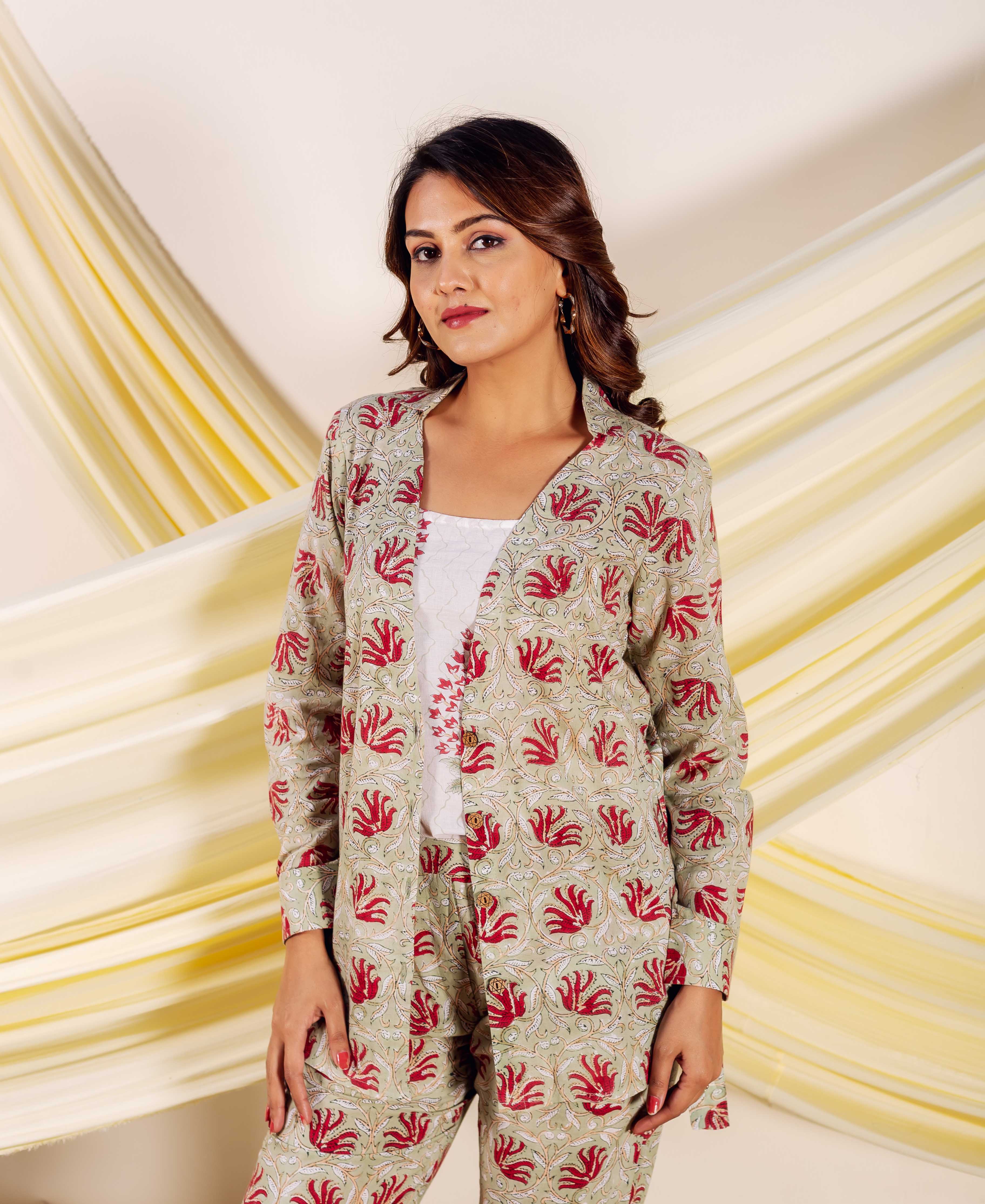 Model in light green hand-block printed Sophiya Co-ord Set with red ethnic floral motifs.