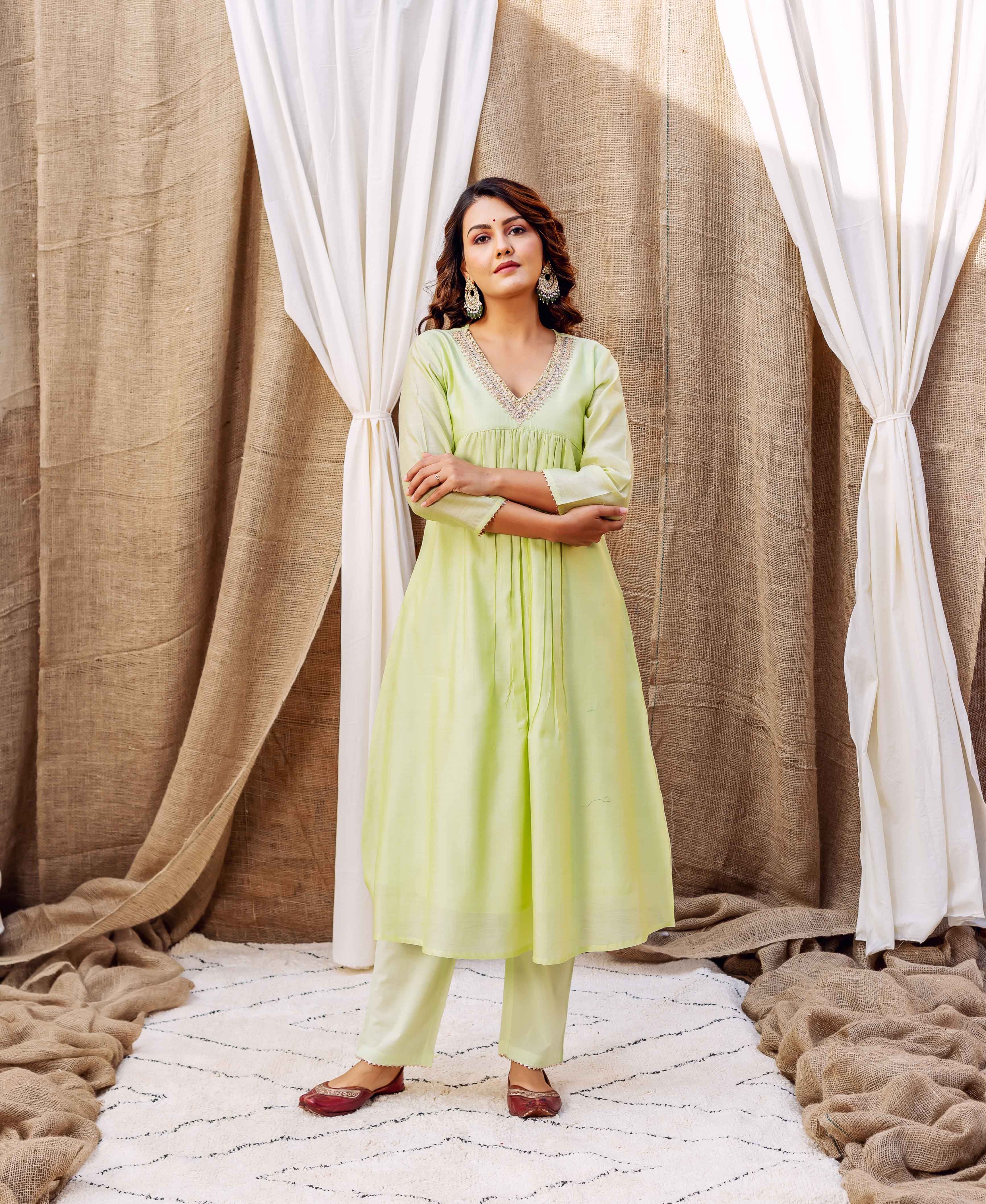Front full look of model in light green Ayesha Embroidered Kurta set.