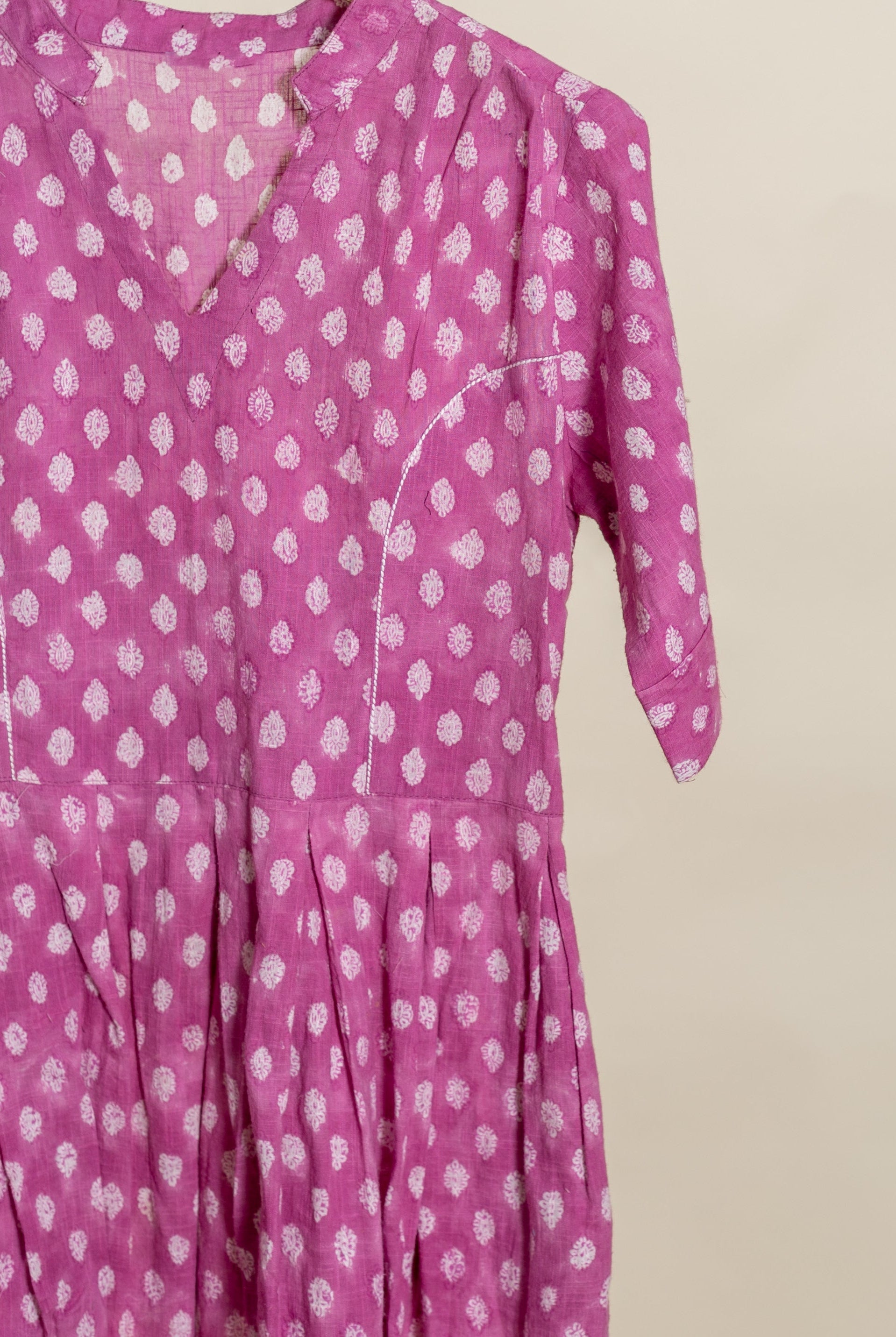 Purple handblock cotton dress with white abstract print, mandarin collar and pleated waist.