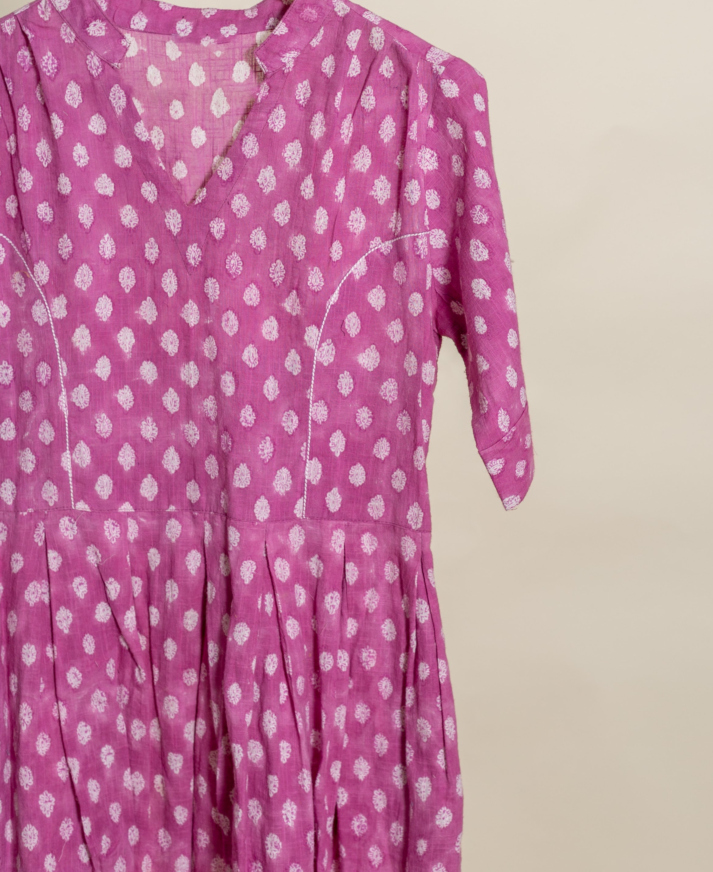 Purple handblock cotton dress with white abstract print, mandarin collar and pleated waist.