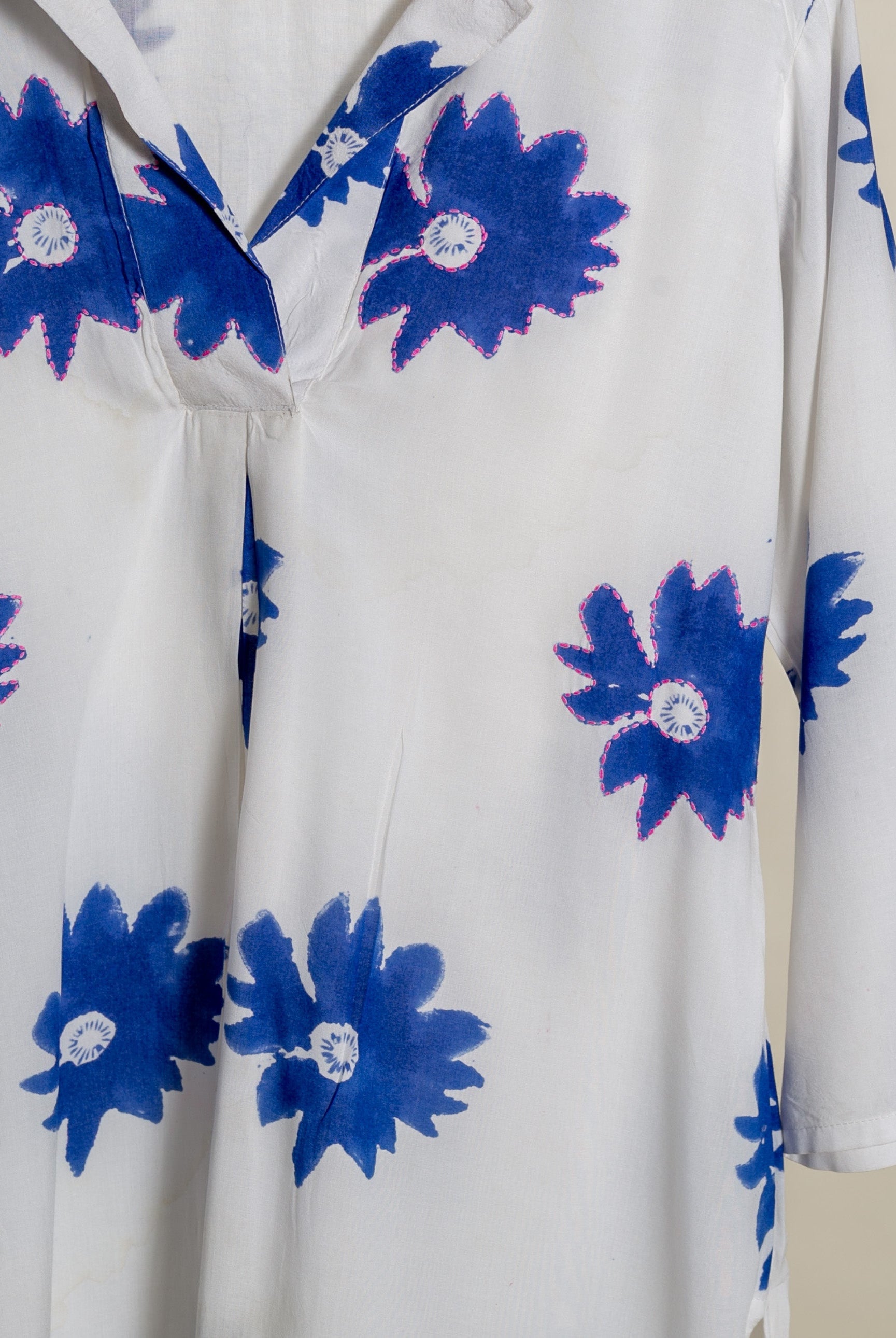 White cotton co-ord set with blue daisy print.