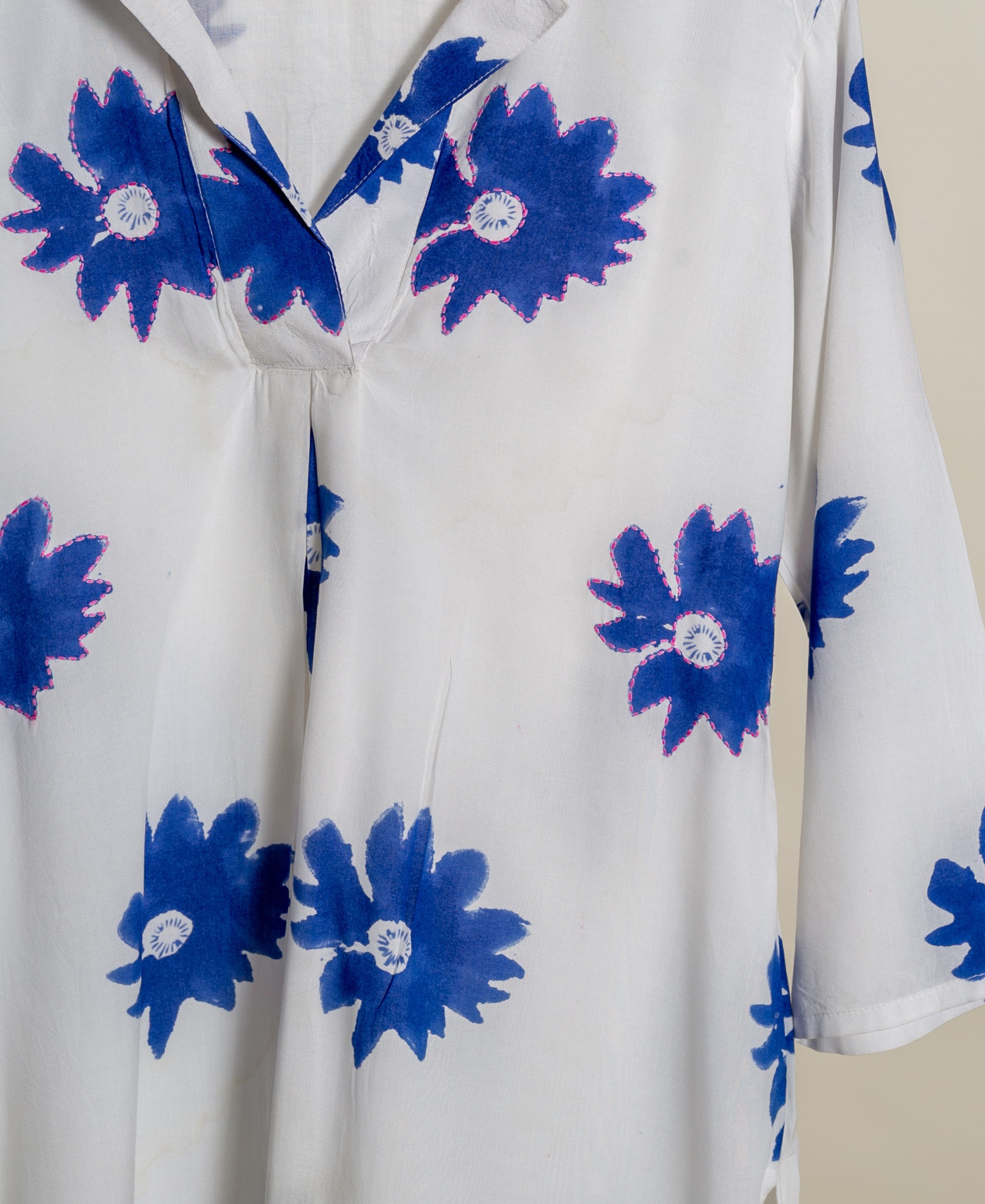 White cotton co-ord set with blue daisy print.