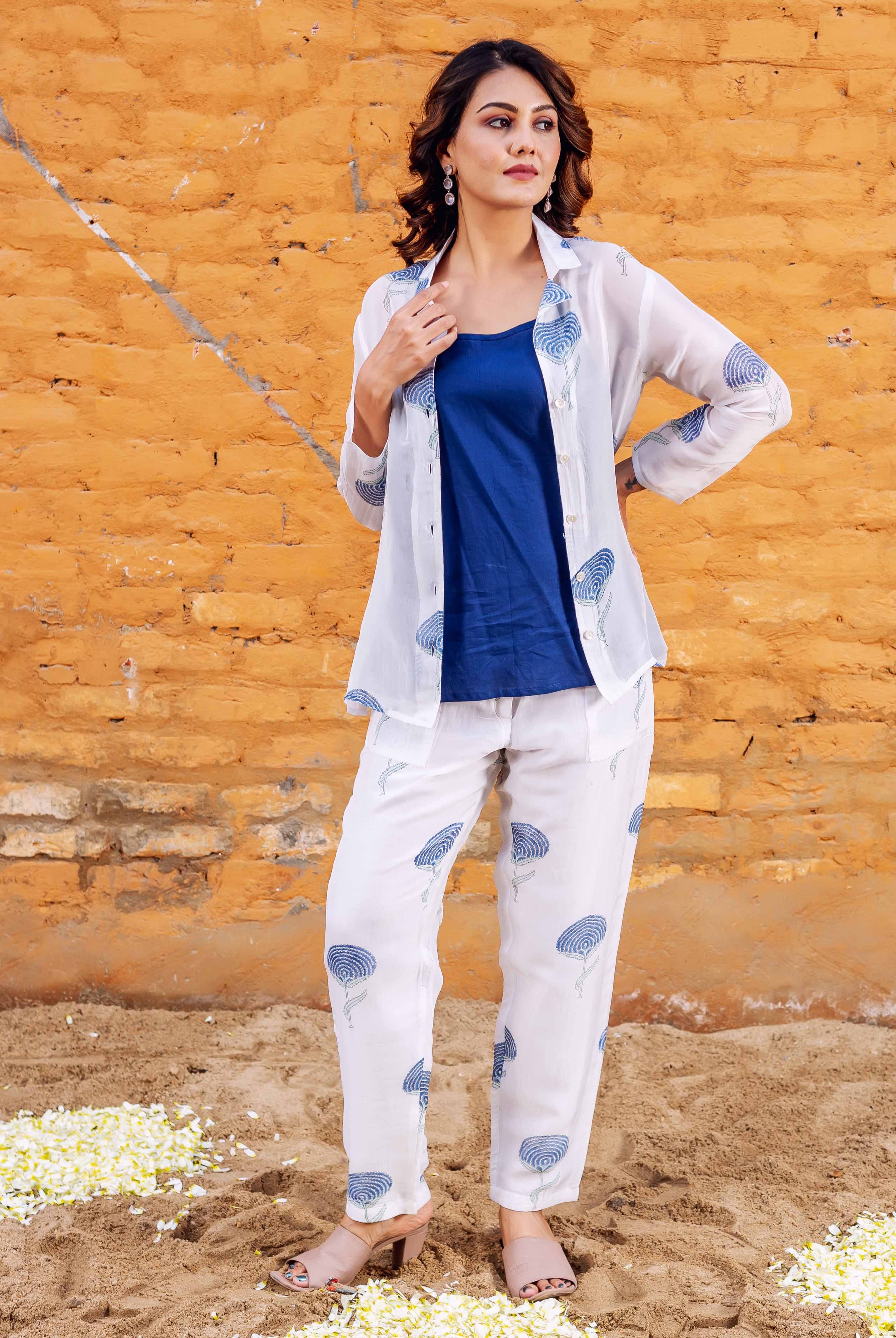 Full body model shot in Charlotte Organza Co-ord Set, white with blue hand-block prints.