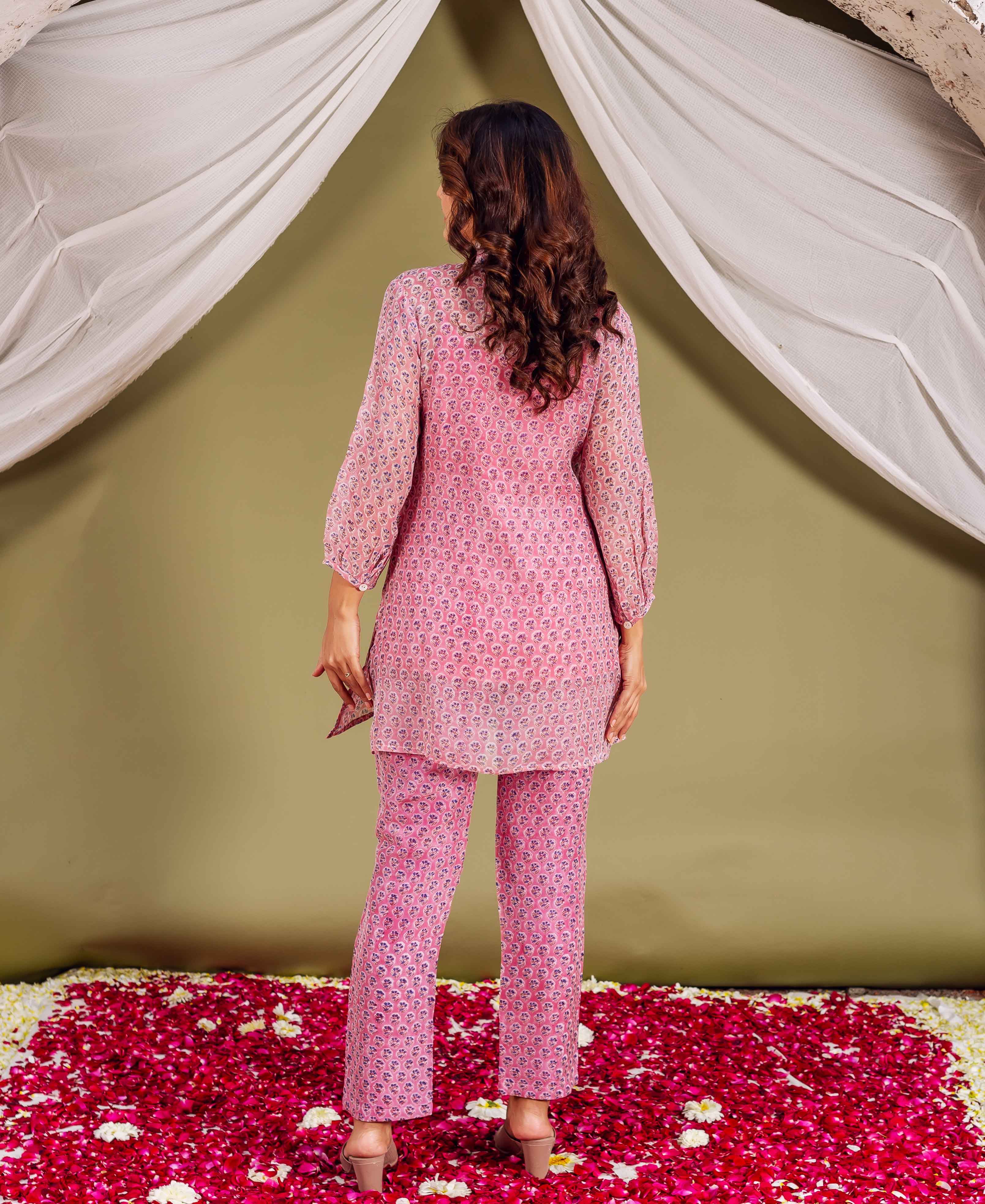 Back view: model in a pink ethnic hand-block-printed co-ord set.