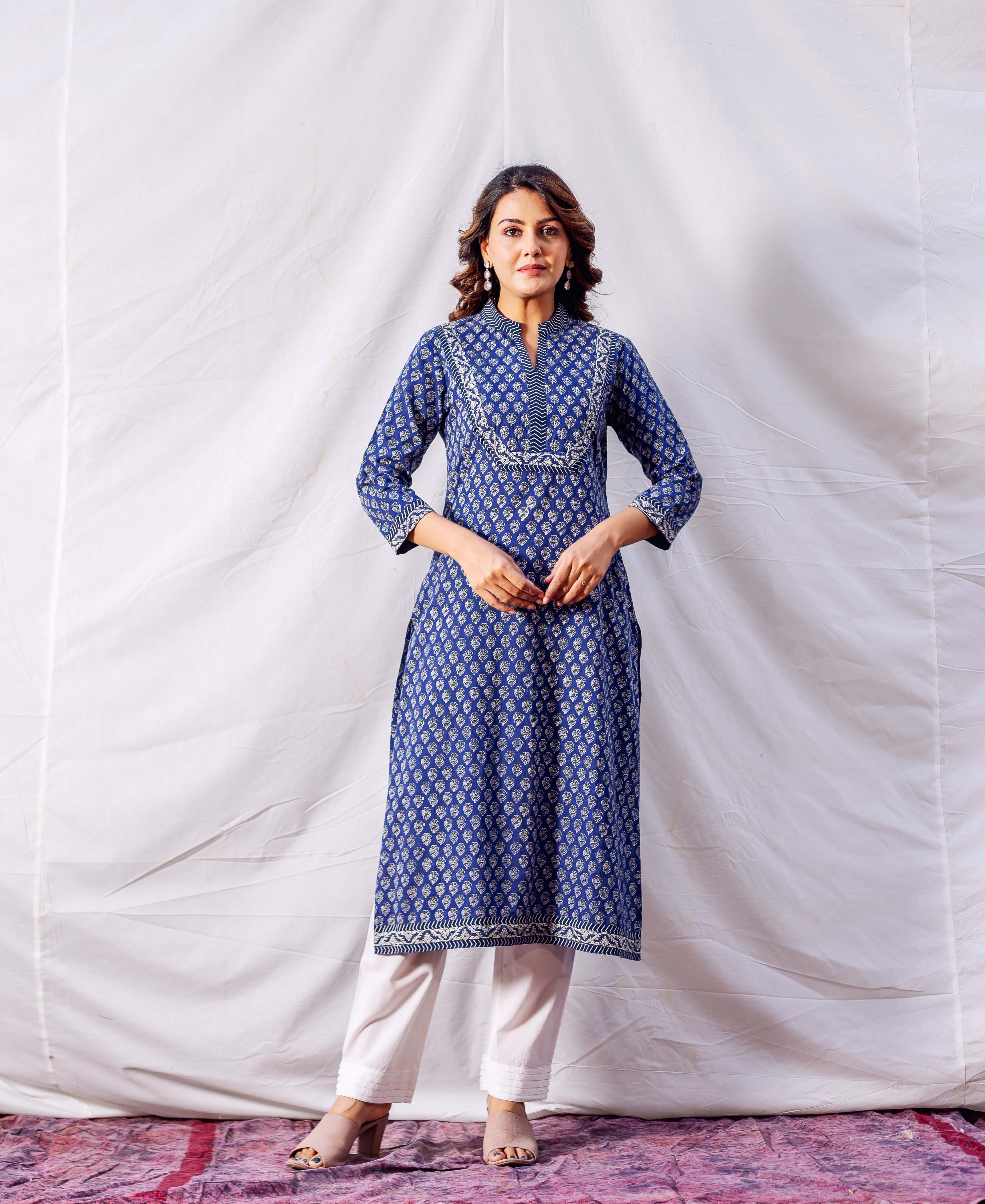 Full front look of model in indigo hand block printed and embroidered straight kurta.
