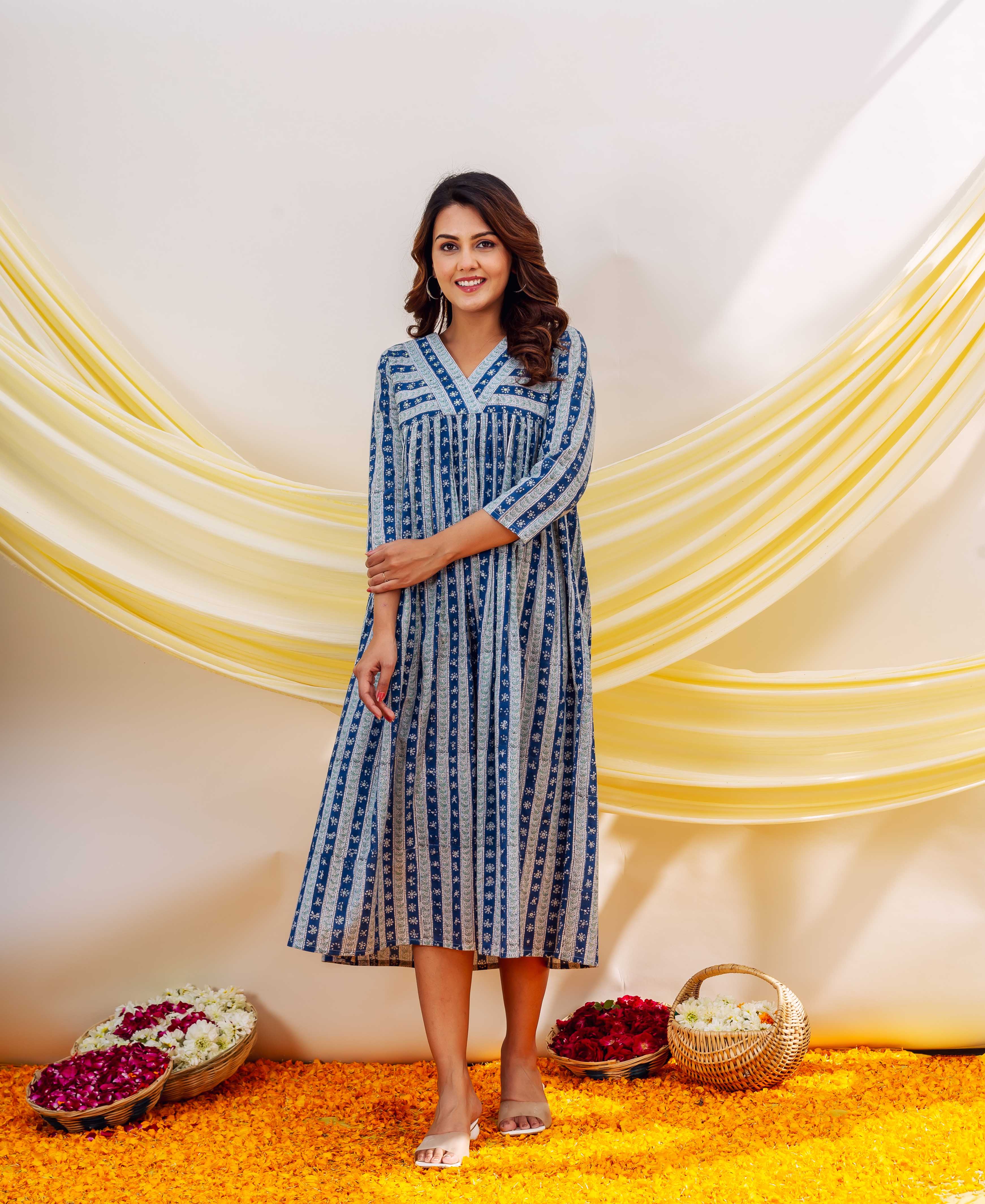 Front view of model wearing a full indigo and white hand-block printed ethnic dress.