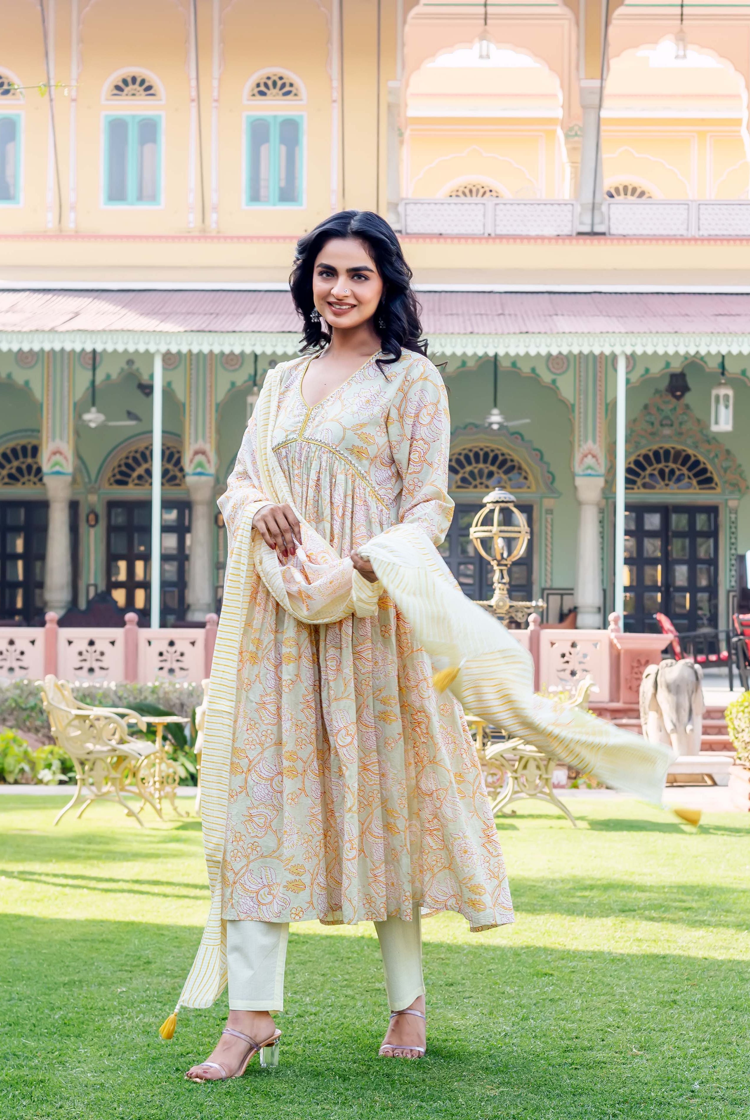 Full-length model in a light Savera floral hand-block-printed ethnic kurta set.