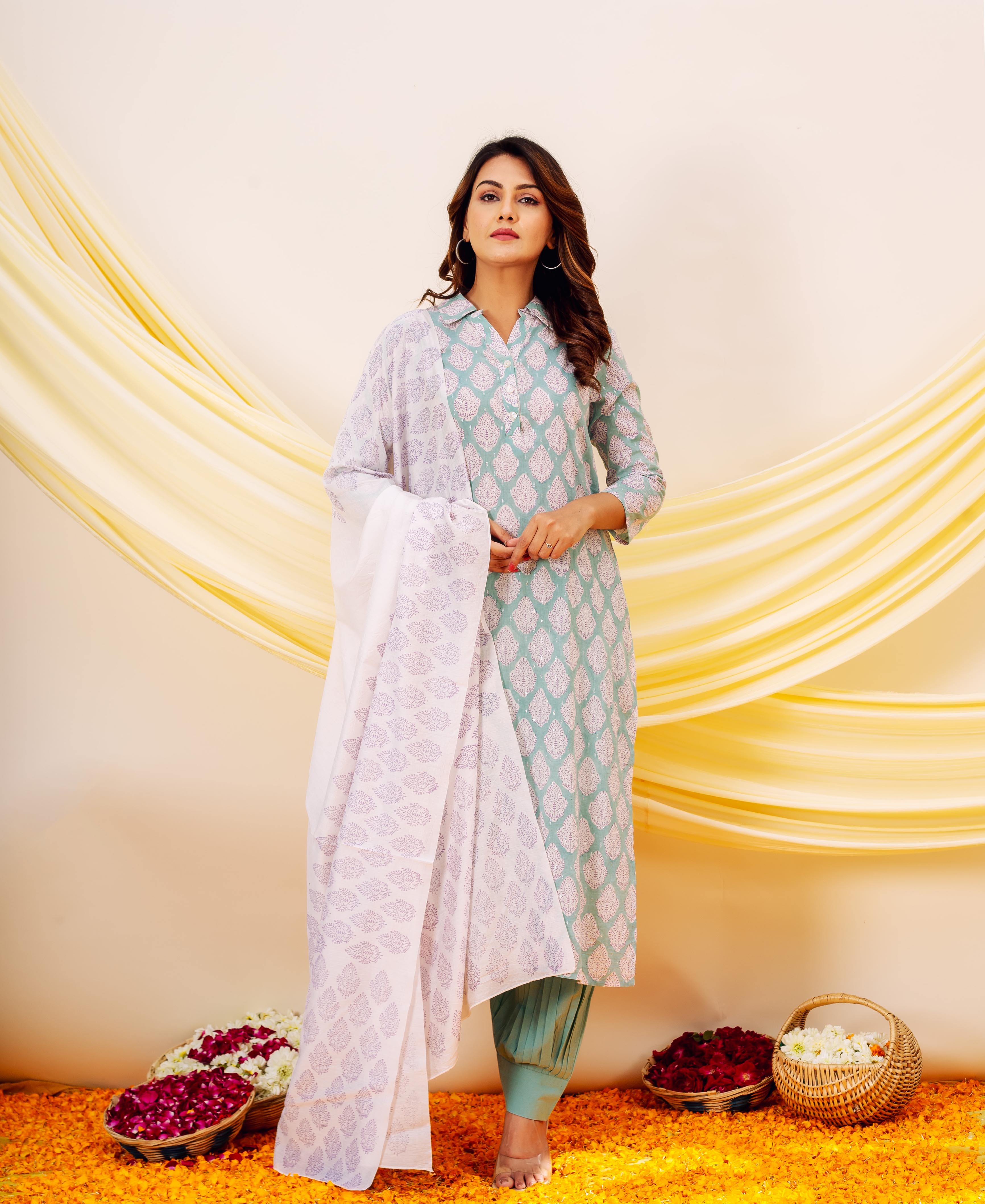 Front view of model wearing a white and purple leaf-pattern hand block printed dupatta.