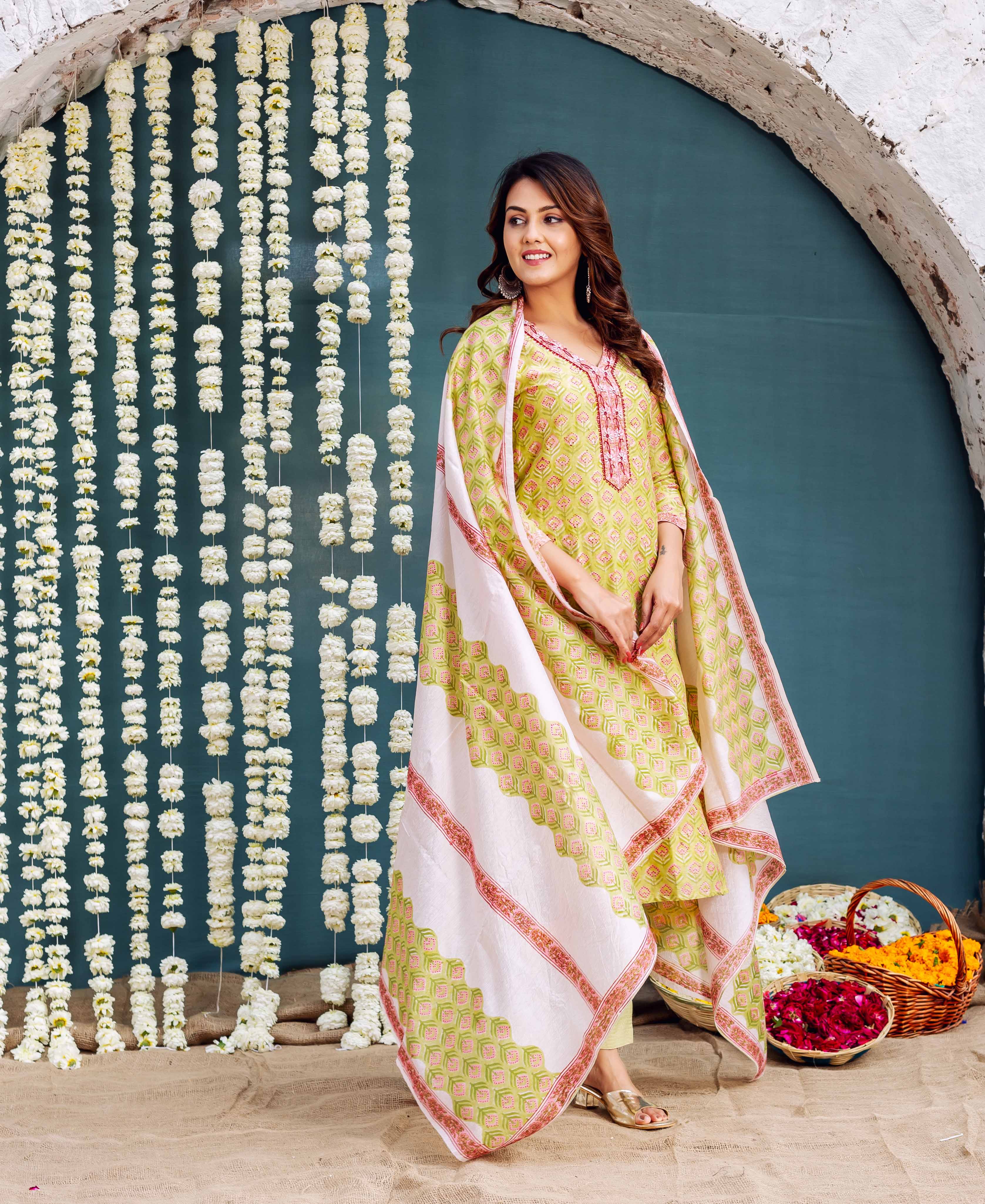 A woman in a green and pink hand-block-printed dupatta.