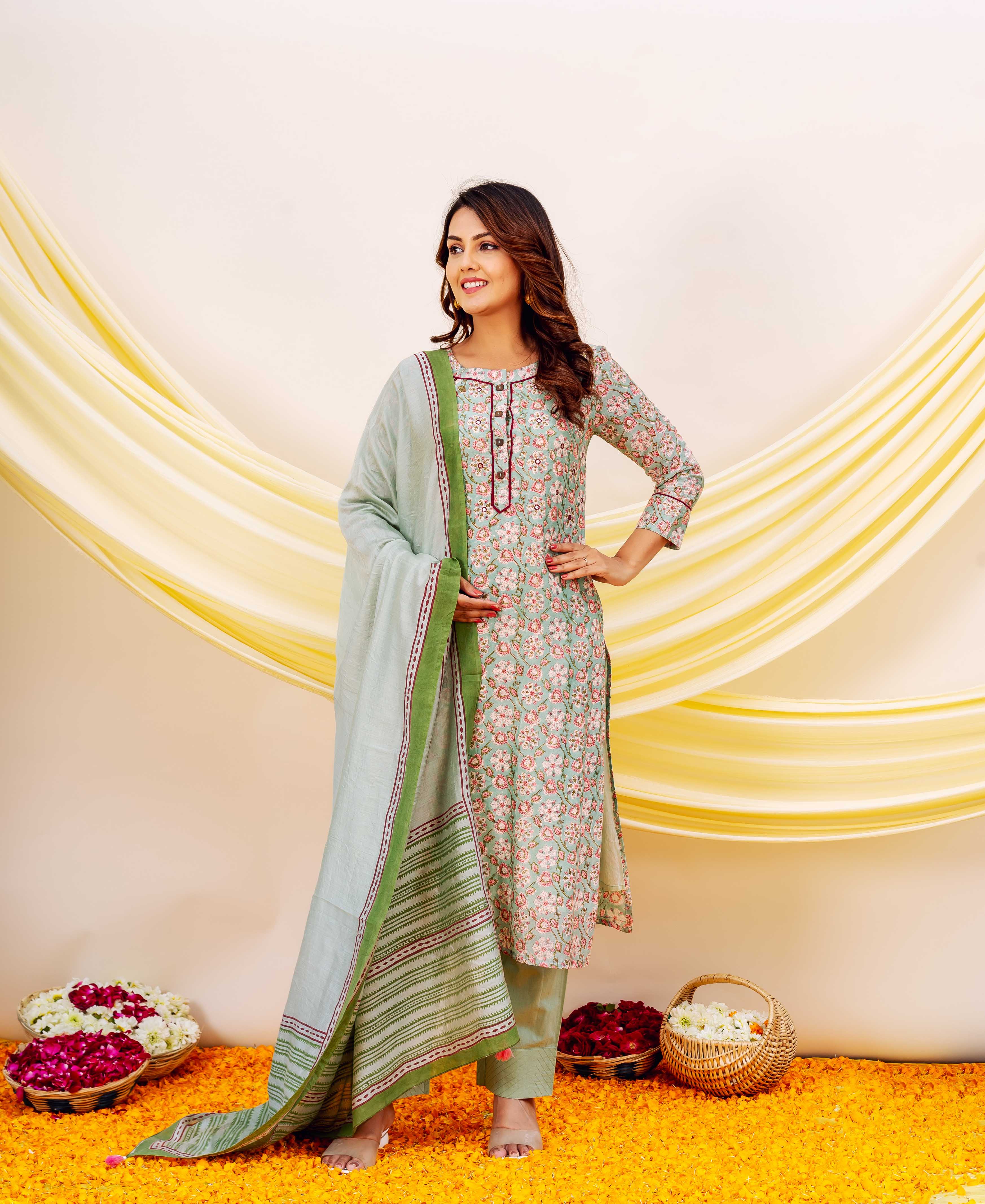 Model wearing a light green hand-block printed dupatta with dark green border.