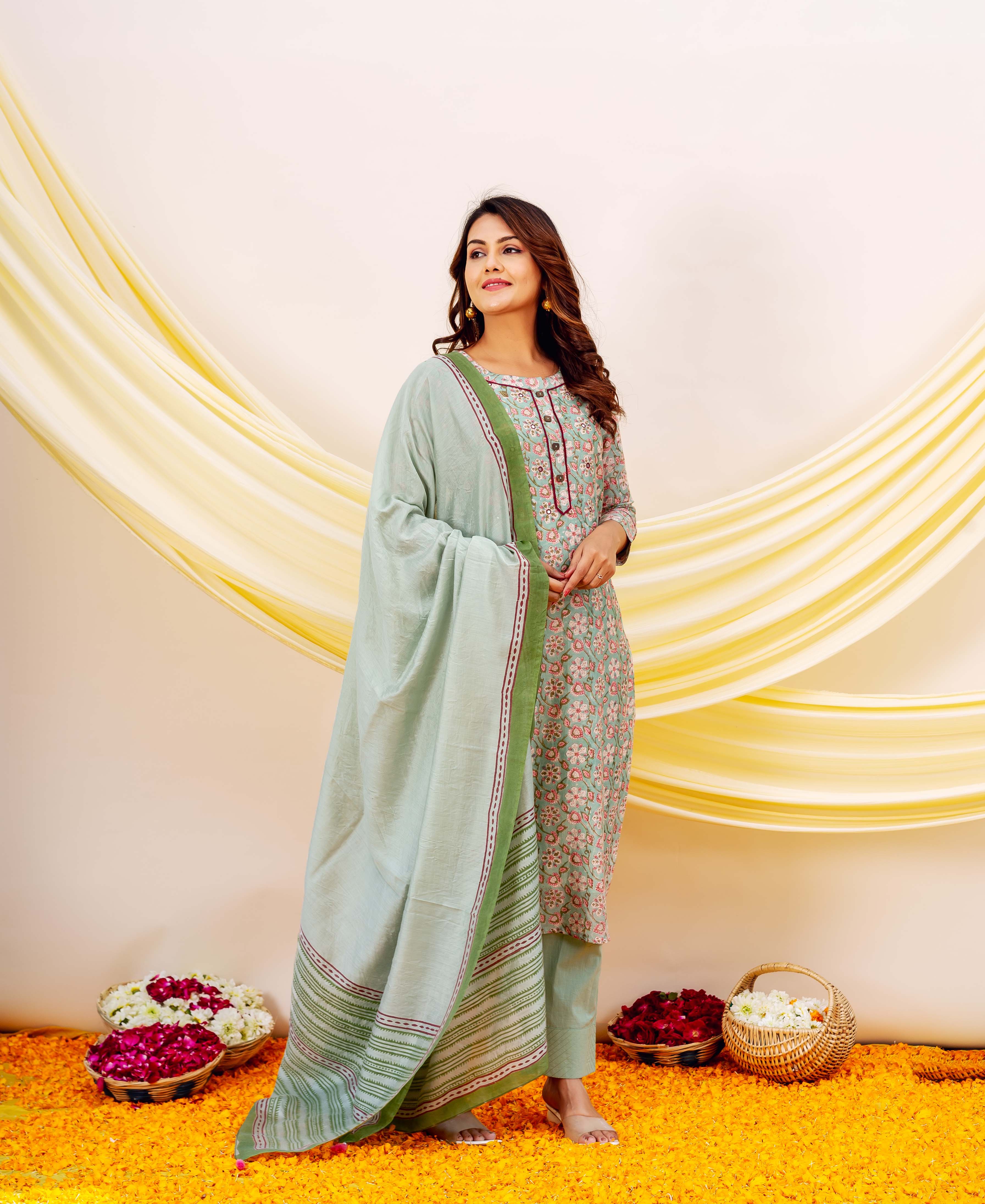 Model showcasing a mint green hand-block printed missprint dupatta with a matching suit.