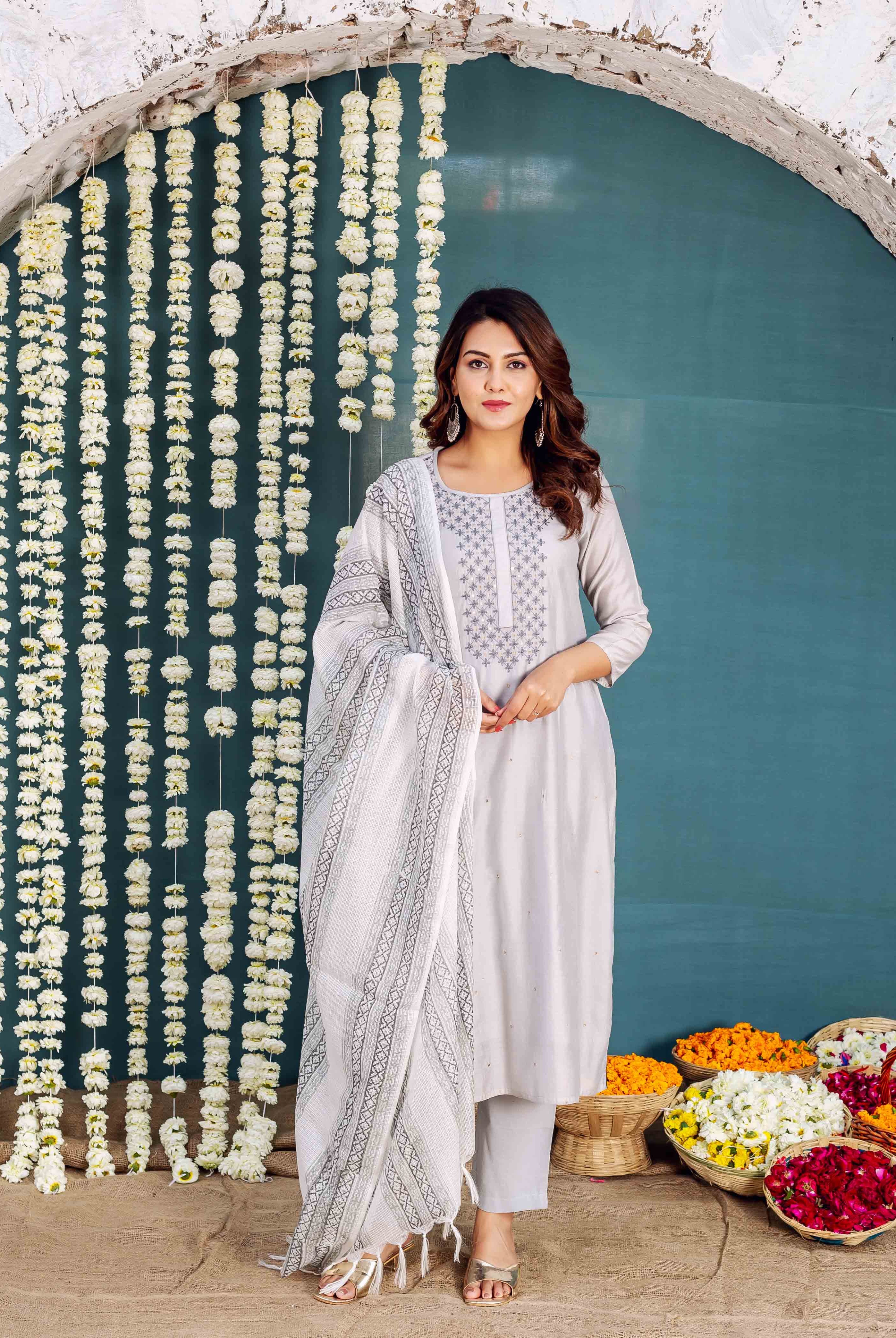 Full-length model in Zara Grey embroidered kurta with matching pants and hand-block-printed dupatta.