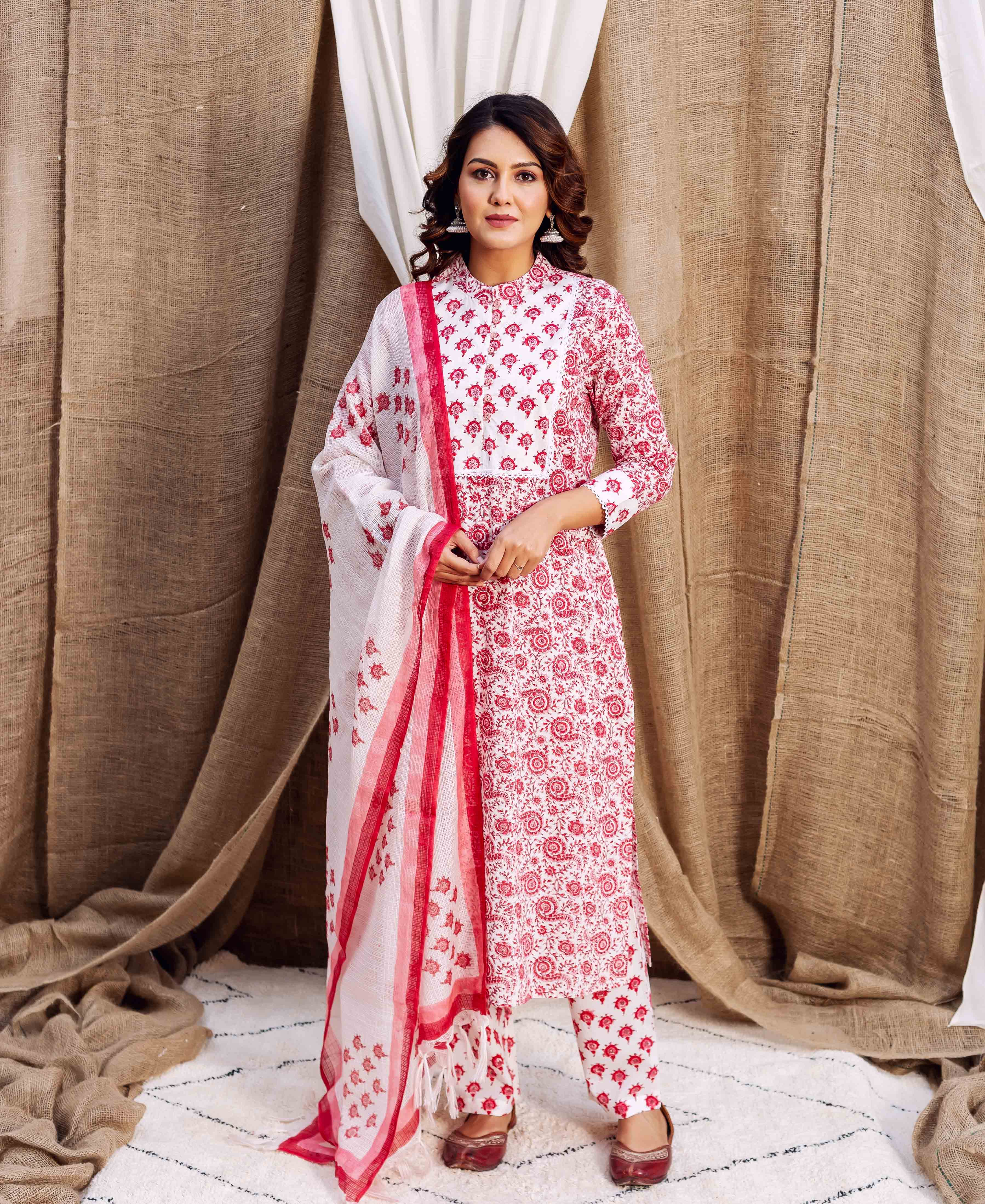 Front-facing model in red and white hand block printed ethnic kurta set with dupatta.