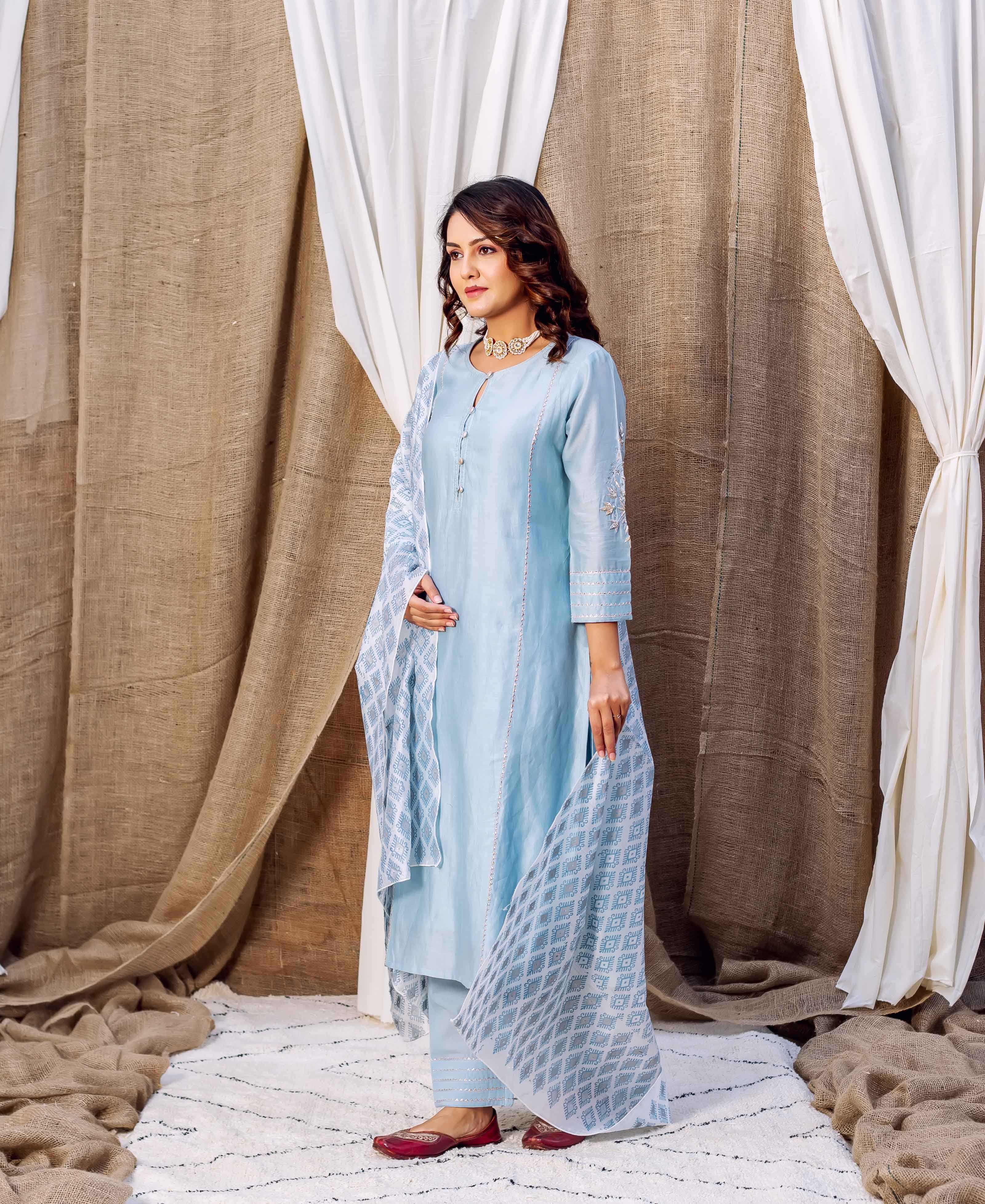 Model in full azure silk chanderi kurta set with geometric hand-block printed dupatta.