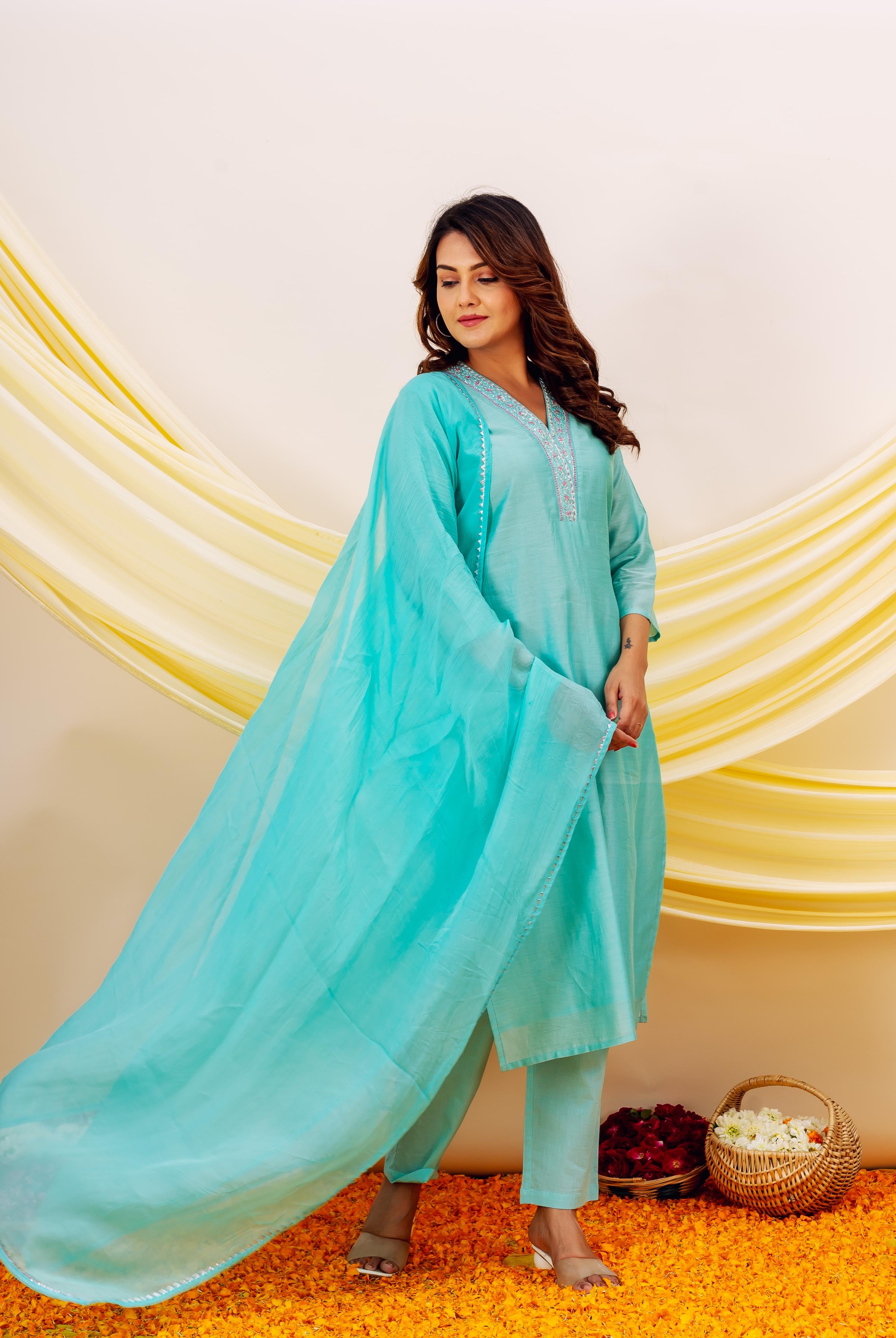 Front view model in aqua Chanderi silk kurta set with embroidered yoke, flowing dupatta.