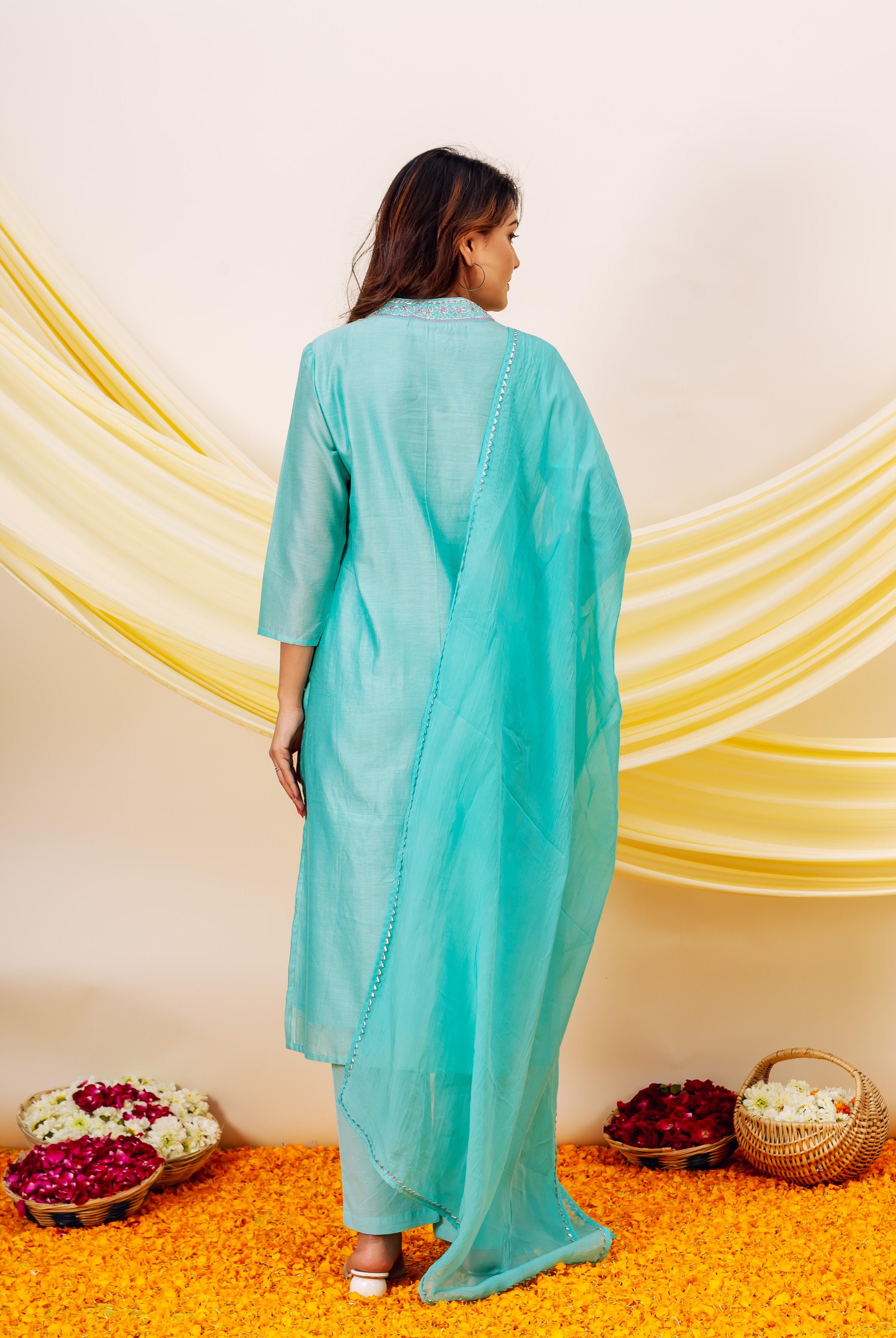 Aqua chanderi silk kurta set on model, back view, with printed yoke and matching dupatta.