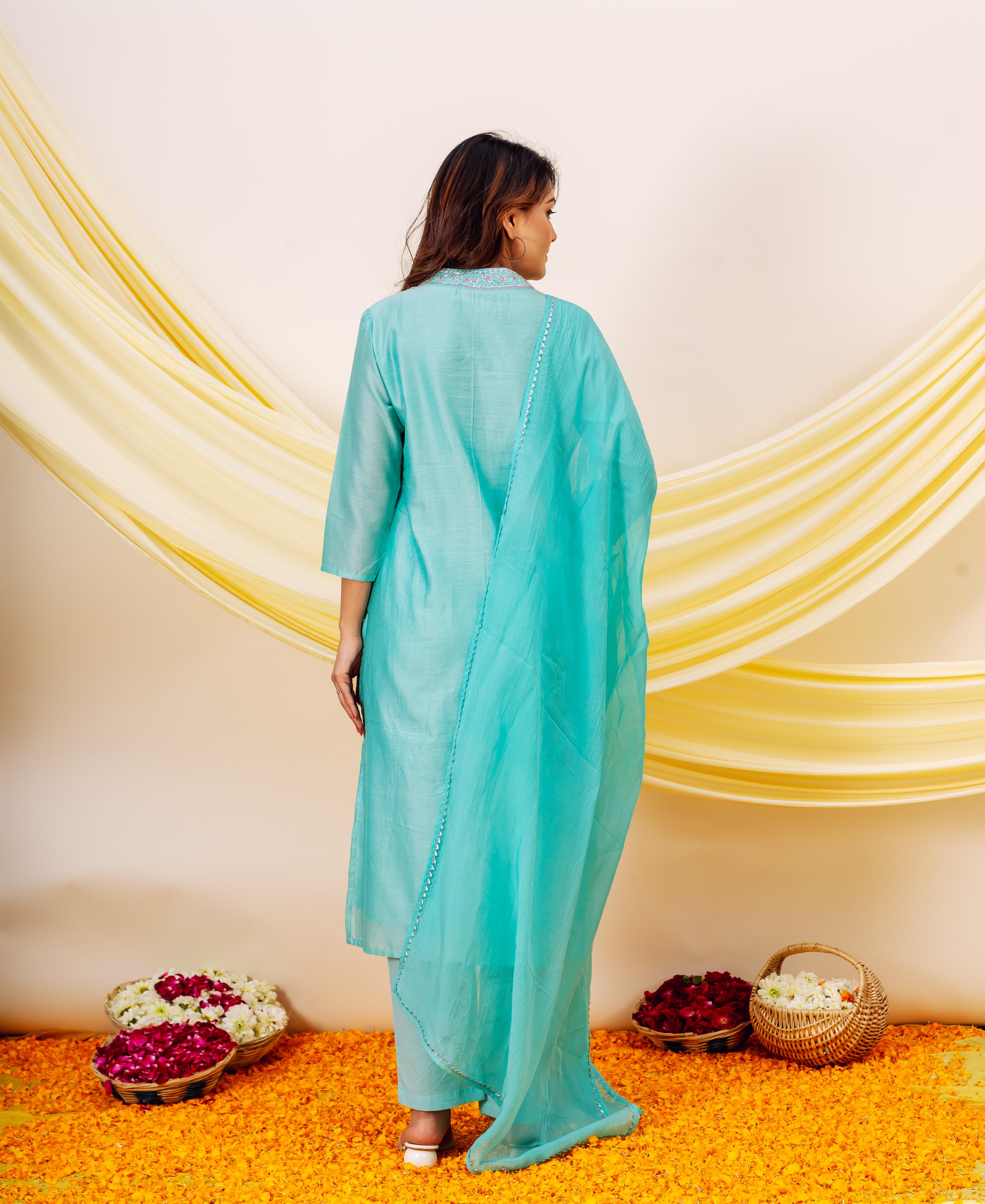 Aqua chanderi silk kurta set on model, back view, with printed yoke and matching dupatta.