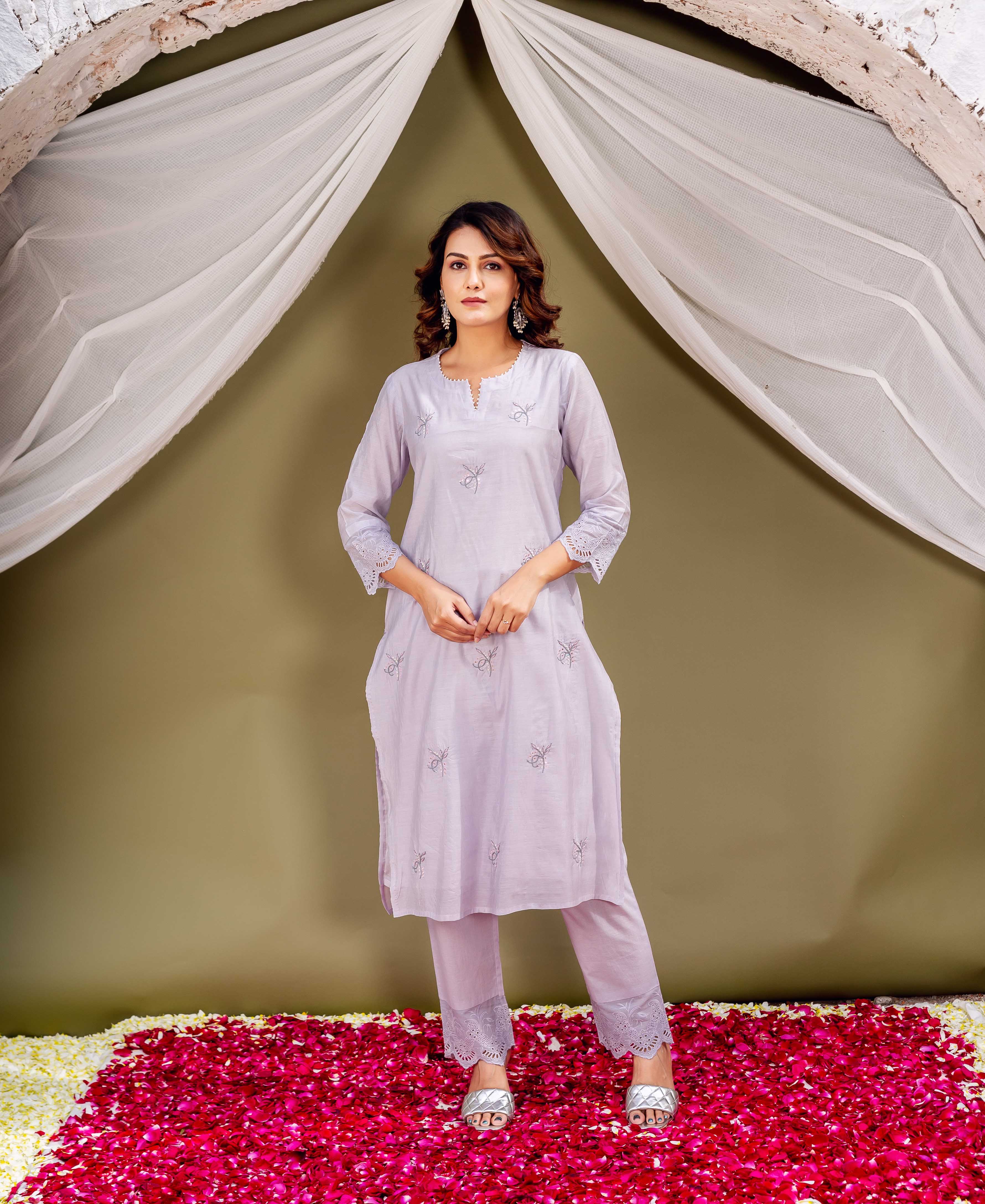 Front shot of model in lavender Chanderi kurta set, embroidered with delicate motifs and lace details.