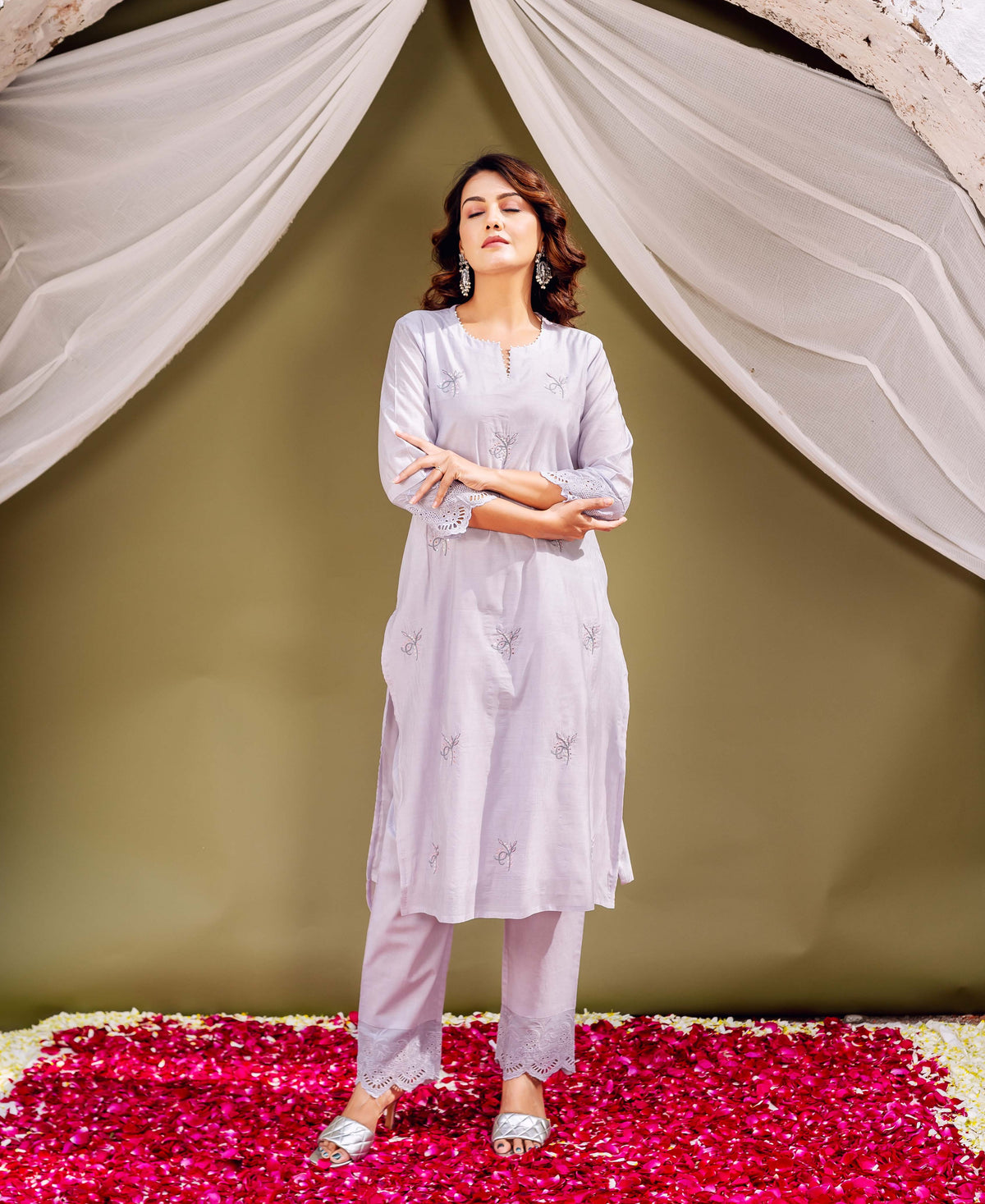 Model in lavender chanderi silk kurta set, with subtle hand-block print and lace trim.