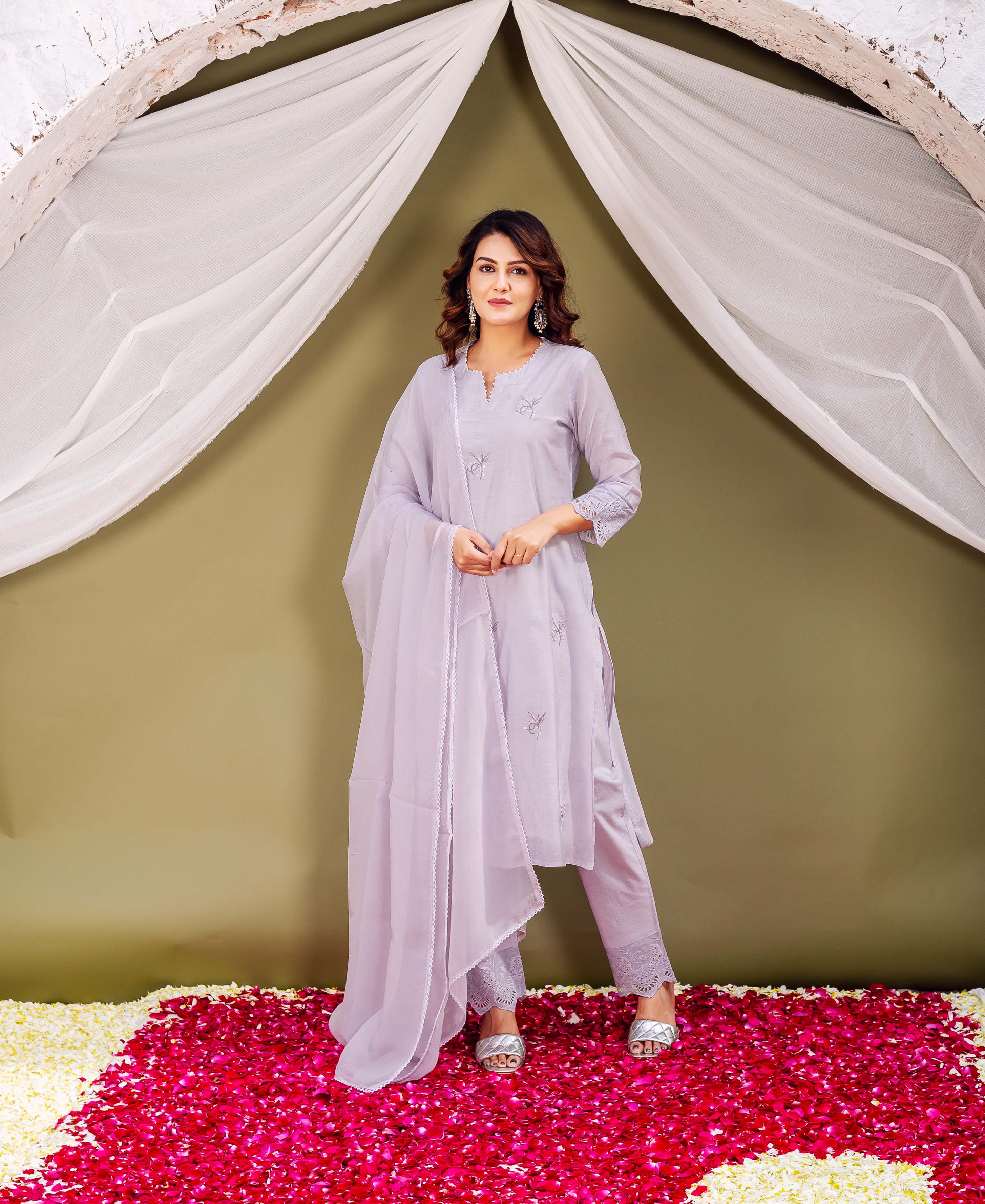 Model wearing a lavender hand-block-printed kurta set with subtle motifs.