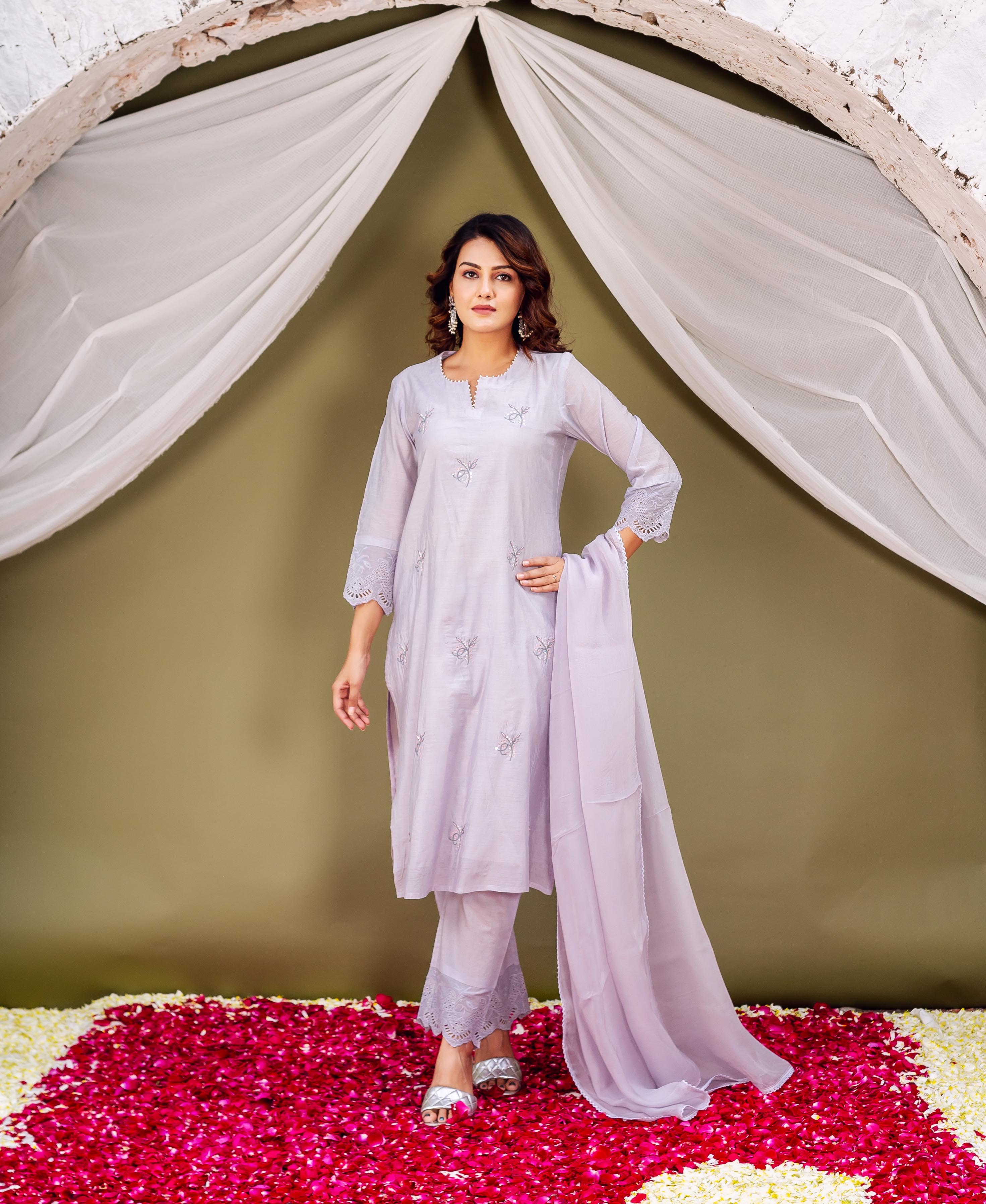 Full body model wearing lavender Chanderi kurta set with delicate embroidered motifs.