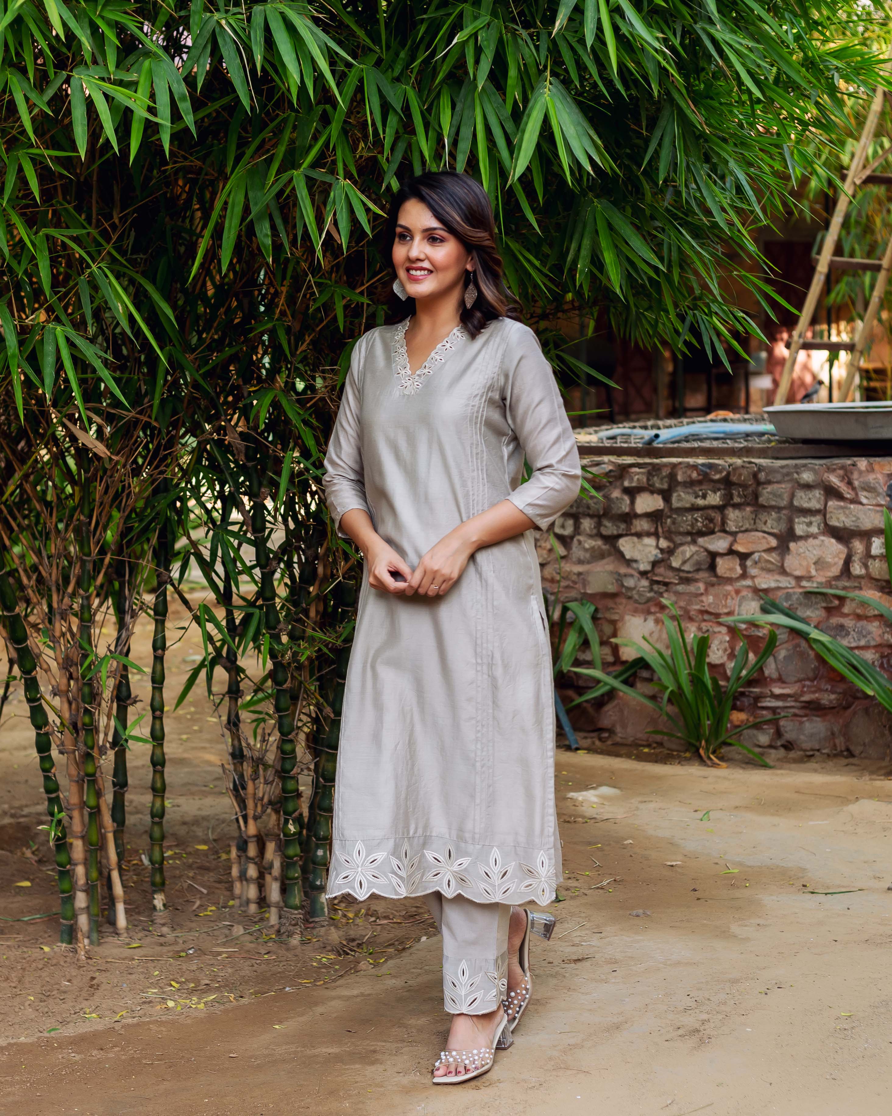 Silver Mist chanderi silk embroidered kurta set on model, light grey with white floral patterns.
