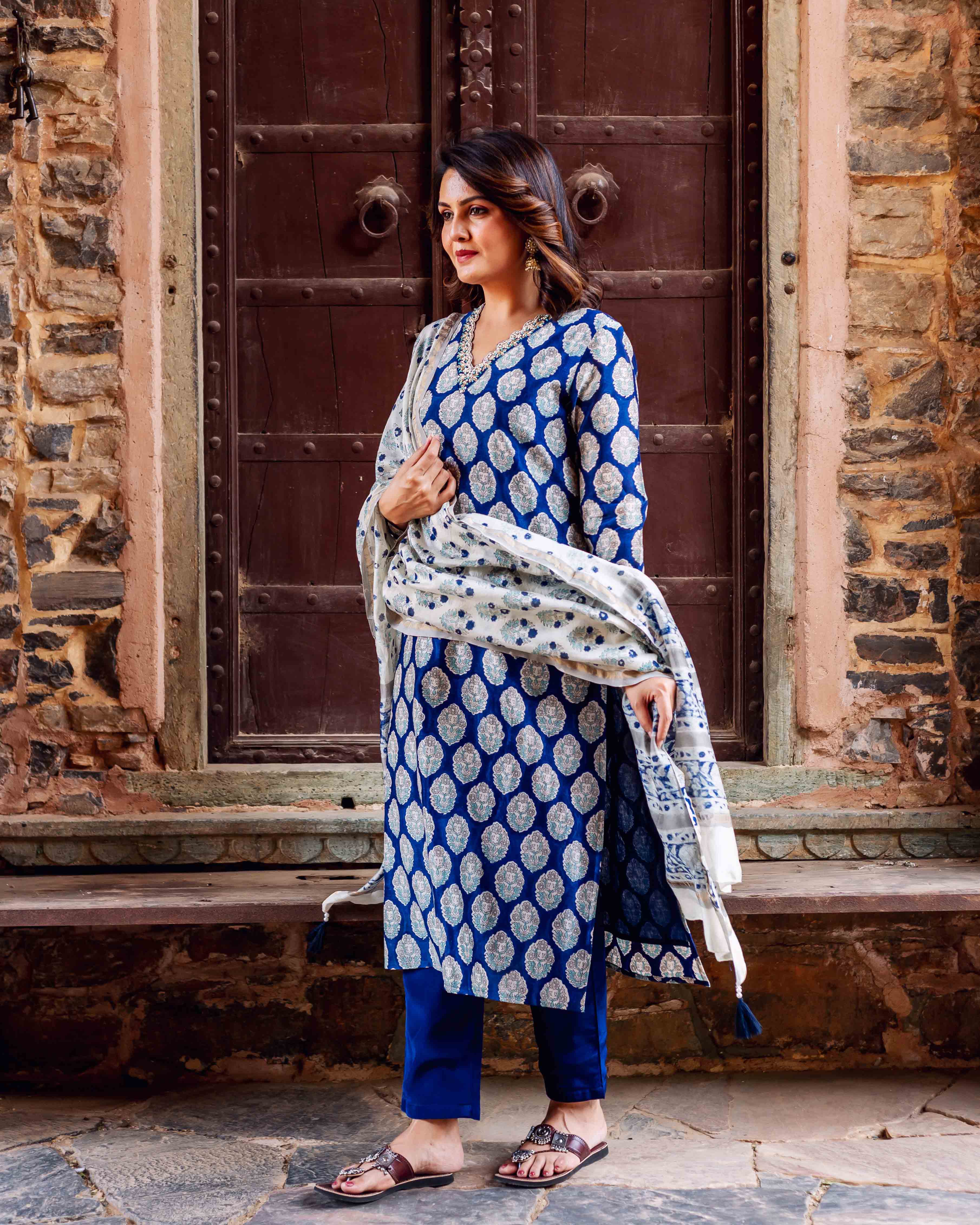 Indigo blue kurta with white patterned hand block print and matching trousers and scarf.