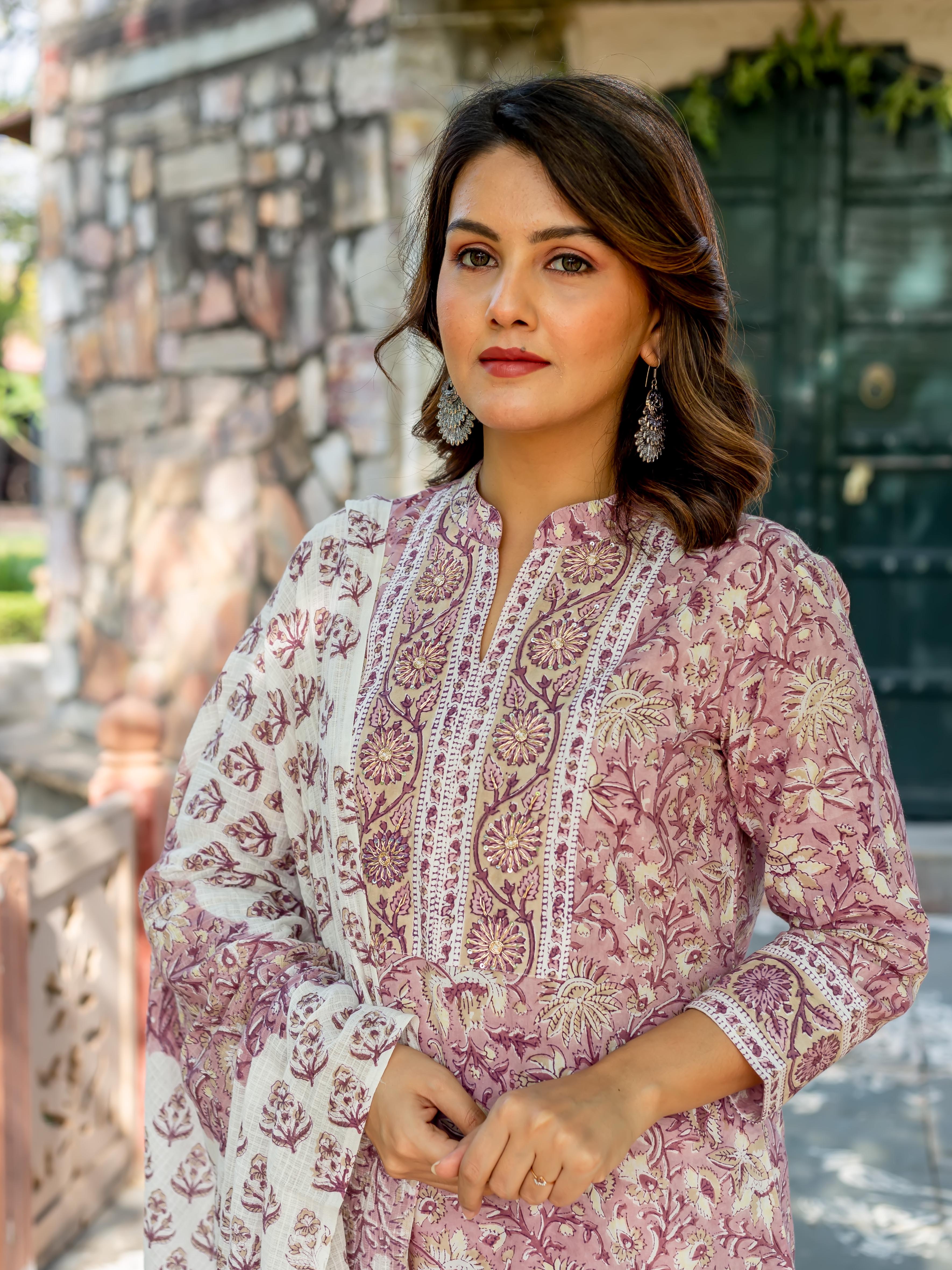 Model in old rose hand-block printed cotton kurta with matching floral dupatta.