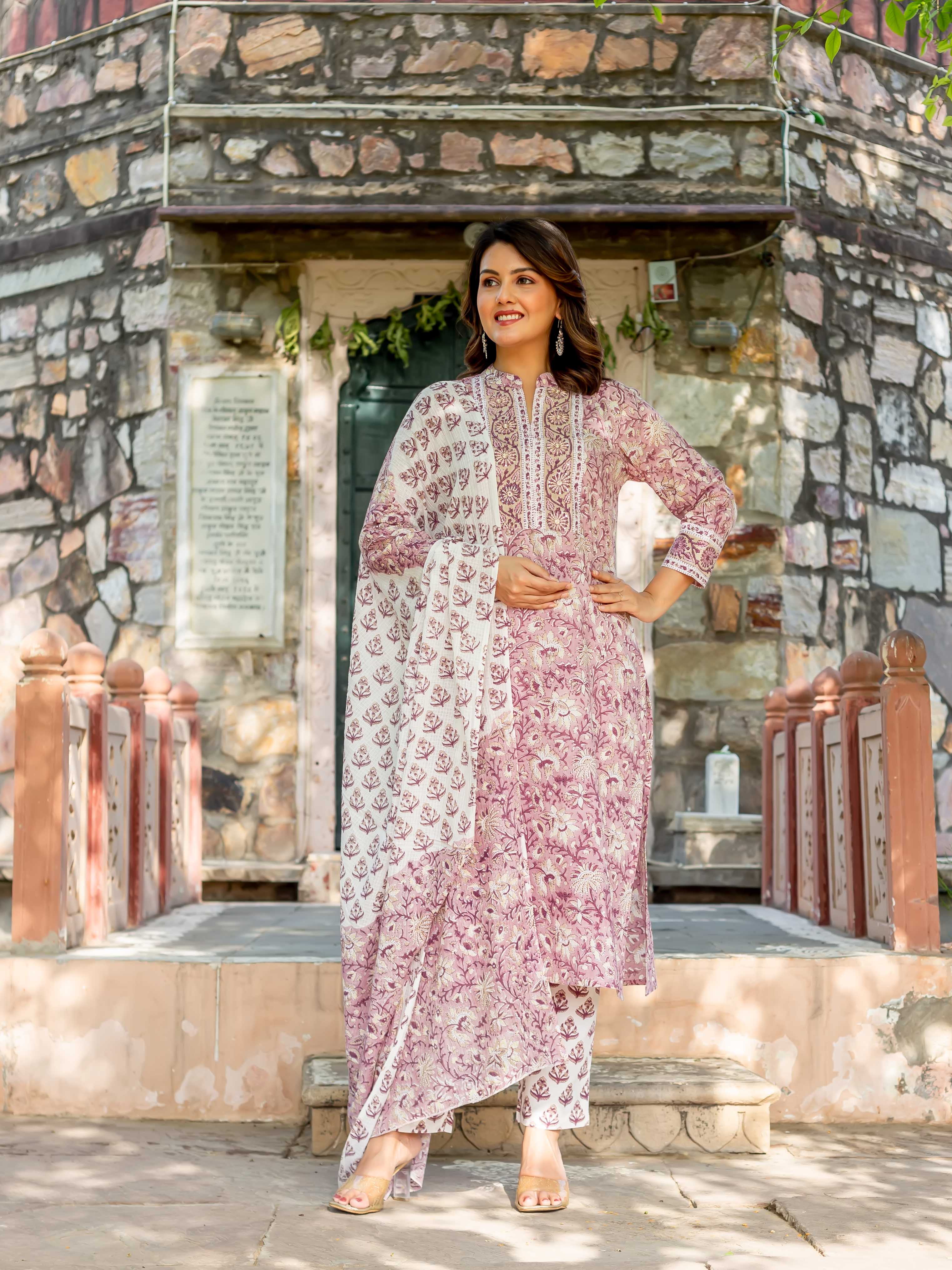 Full-length model in an old rose and white hand-block-printed cotton kurta set.
