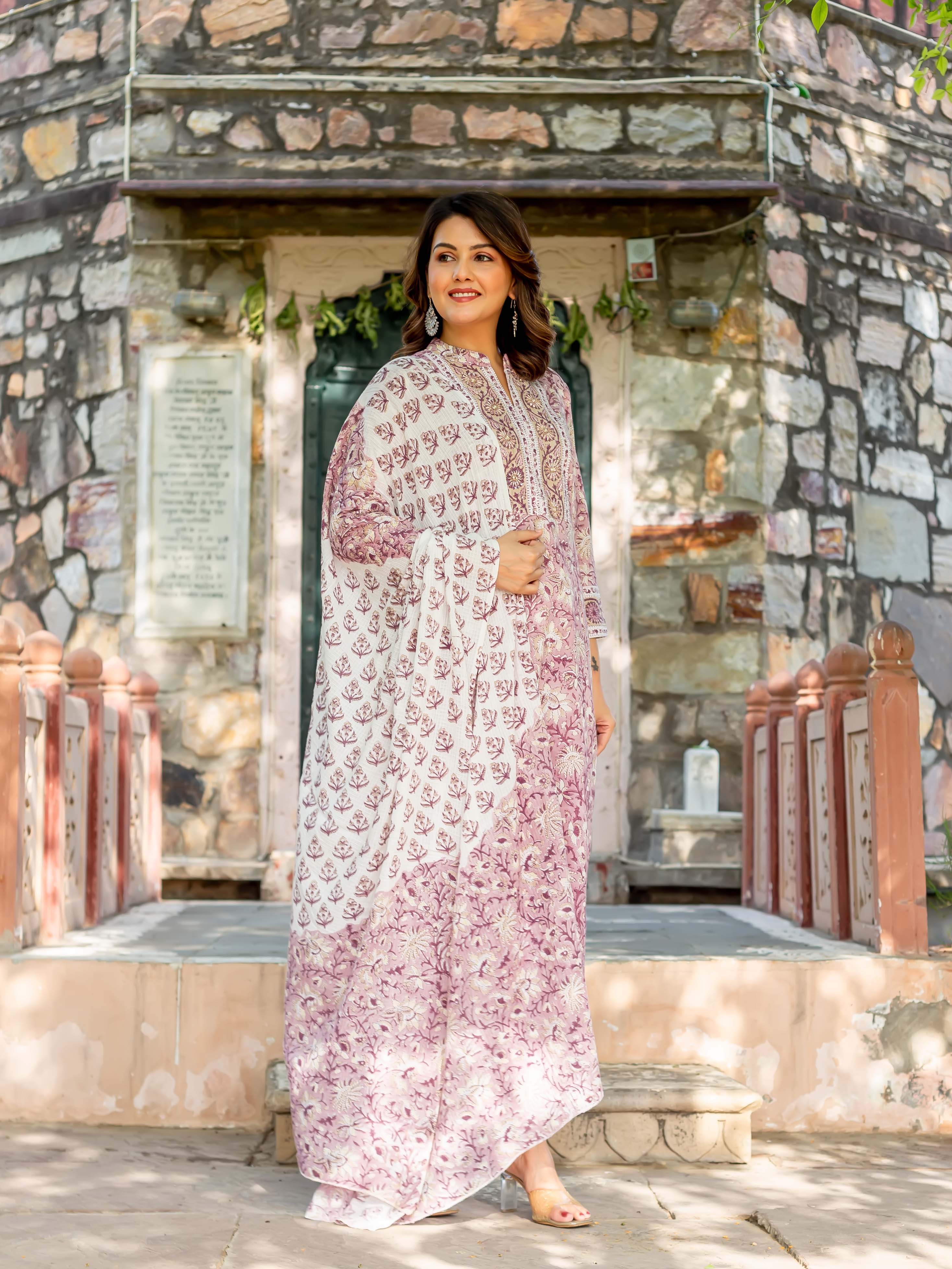 Model in a full-length off-white Old Rose hand-block-printed cotton kurta with matching dupatta.