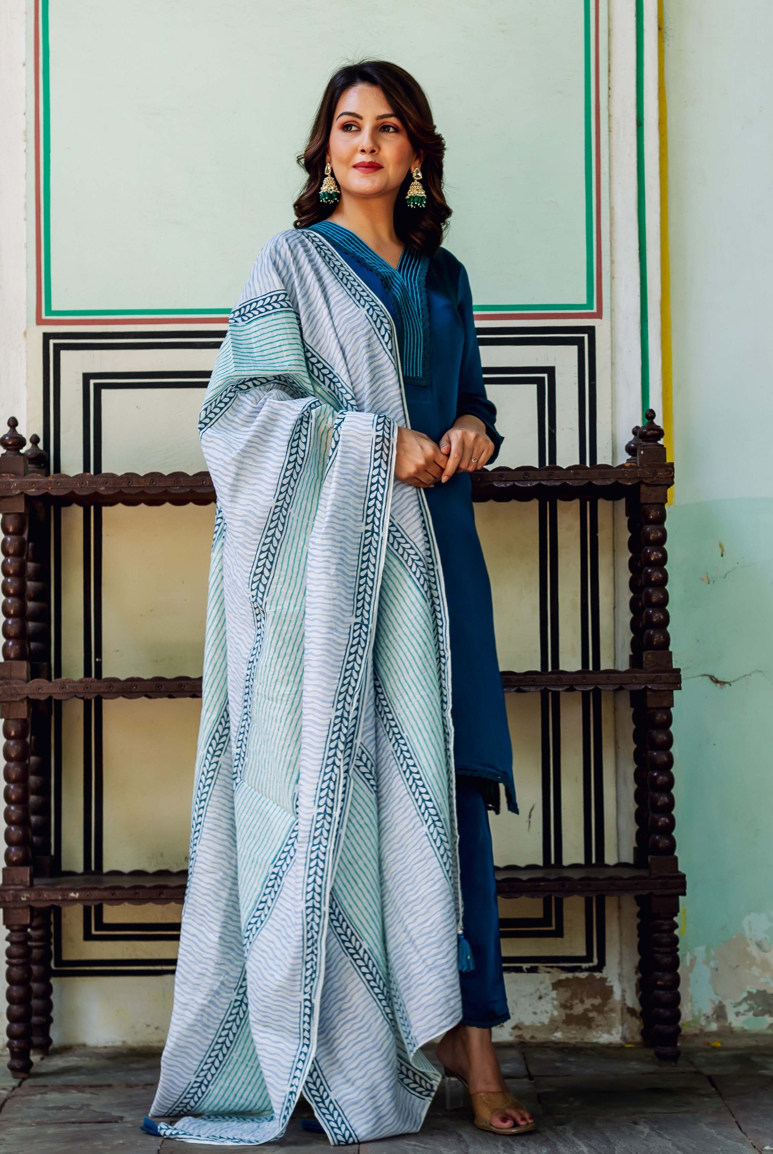 Model in royal blue kurta set with a missprint hand-block printed light blue dupatta.