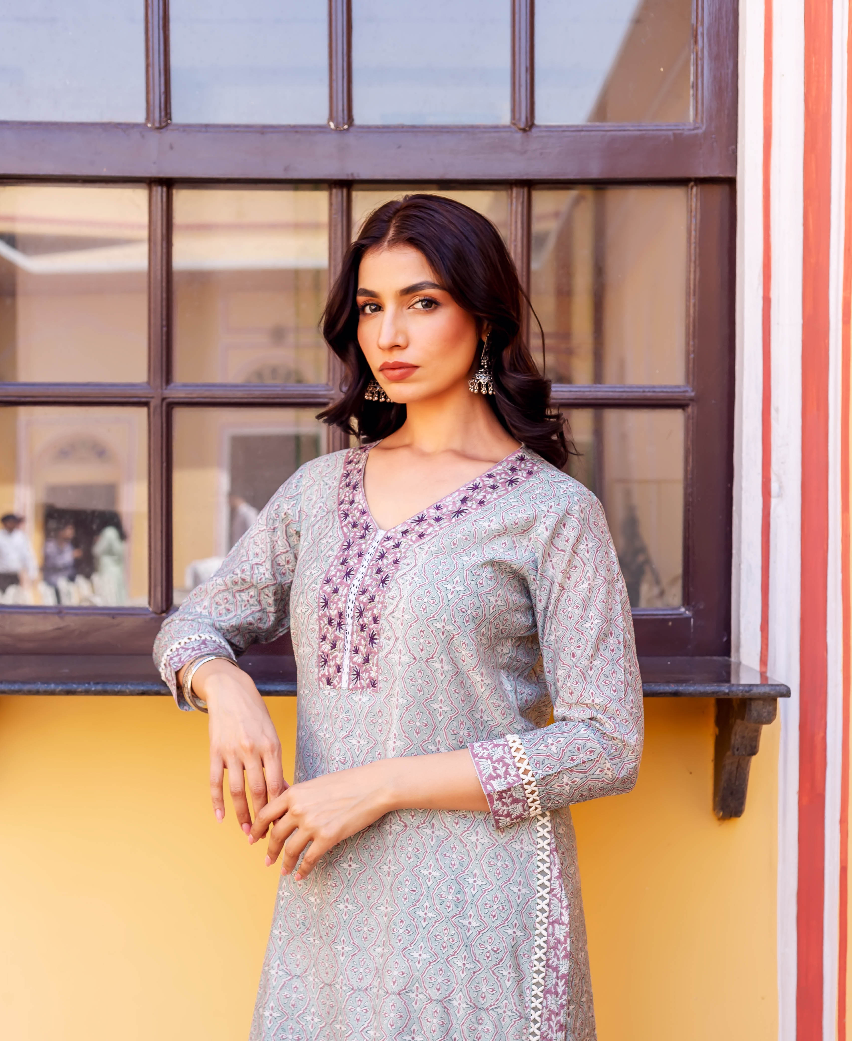 A model wearing a grey block-printed Chanderi kurta with intricate designs.