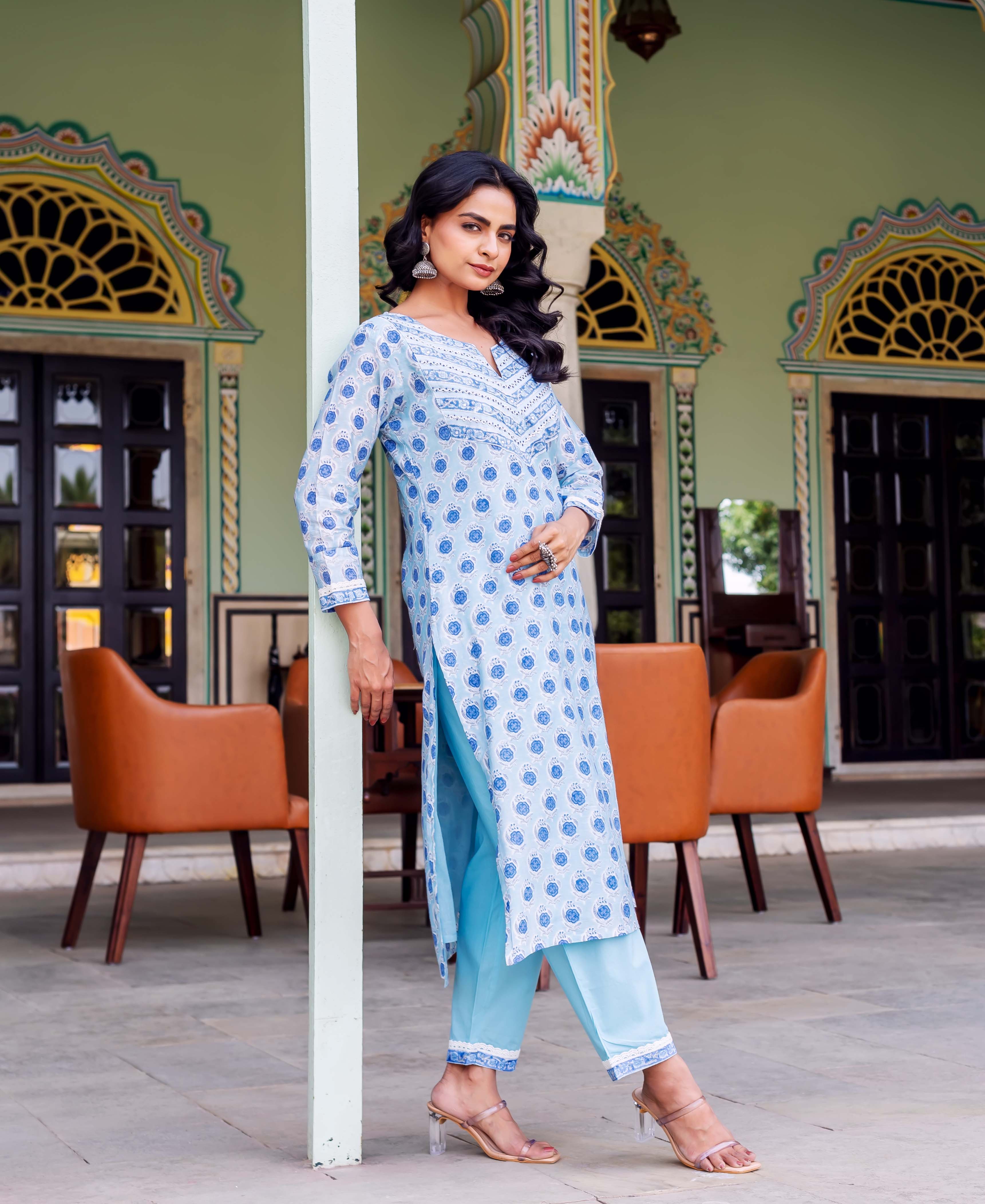 Full-length photo: model in a light blue block-printed kurta and matching pants.