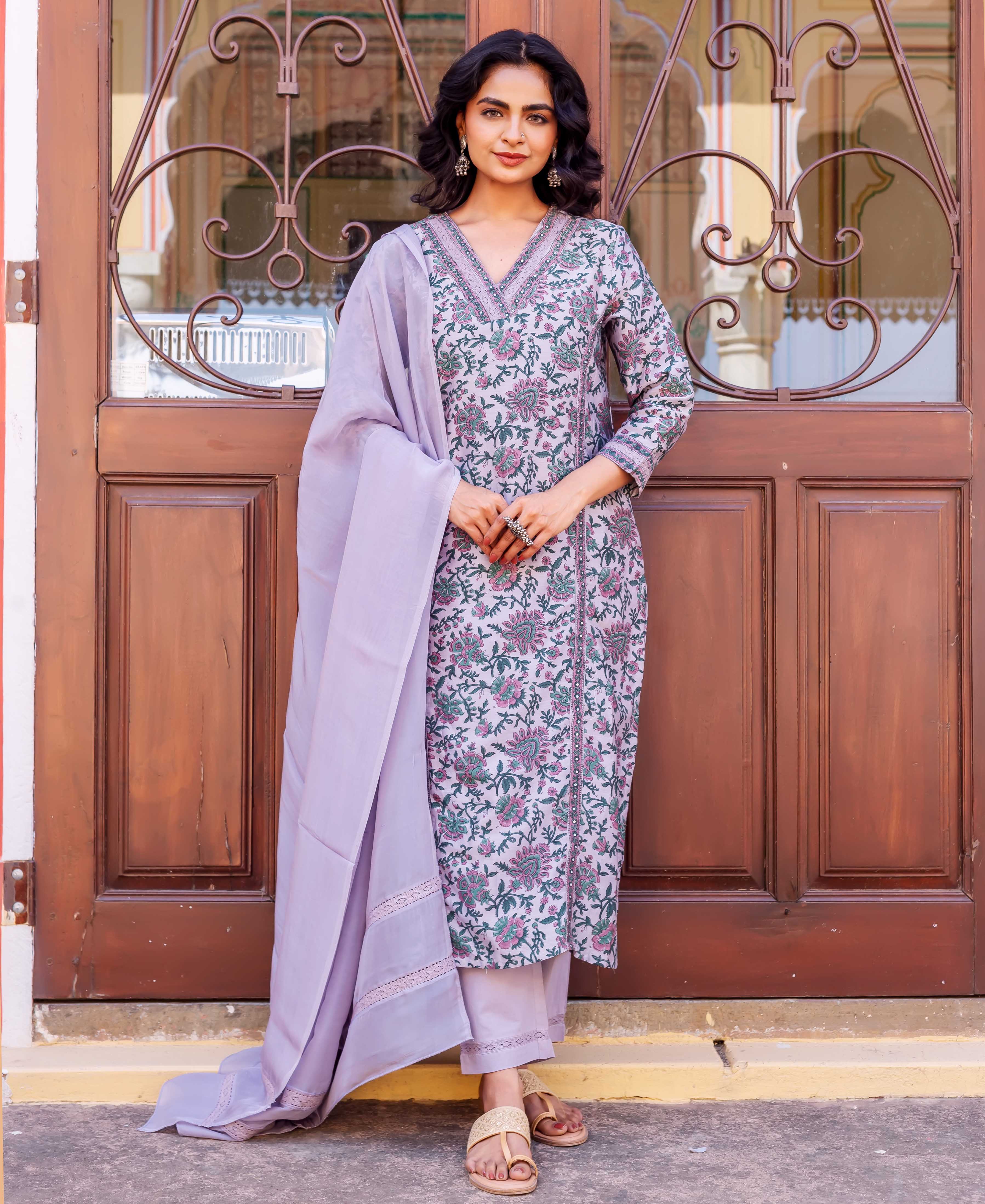 Lavender and pink floral printed silk chanderi kurta with lilac dupatta and trousers.