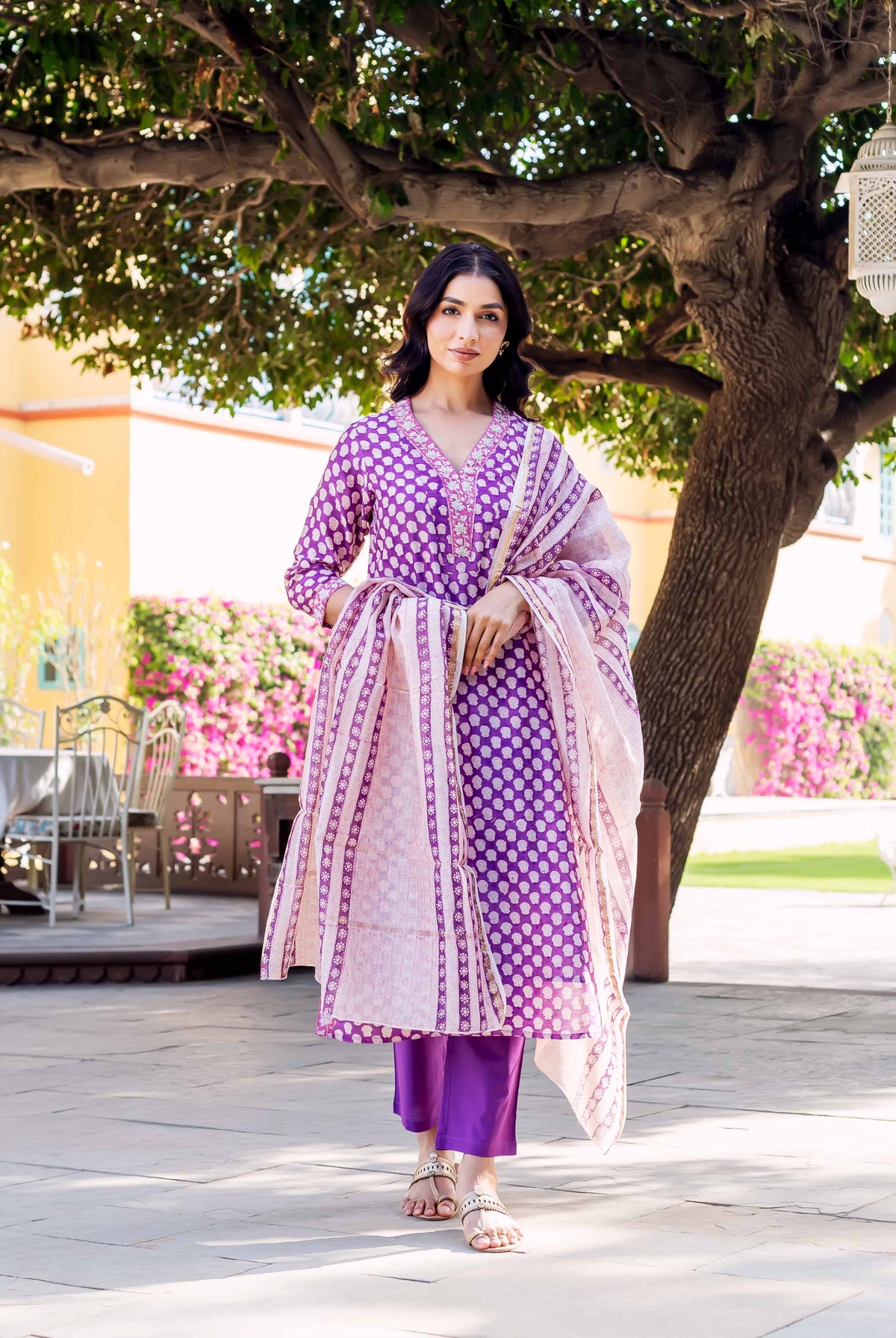Purple and white hand-block-printed chanderi kurta with white patterned dupatta and purple pants.