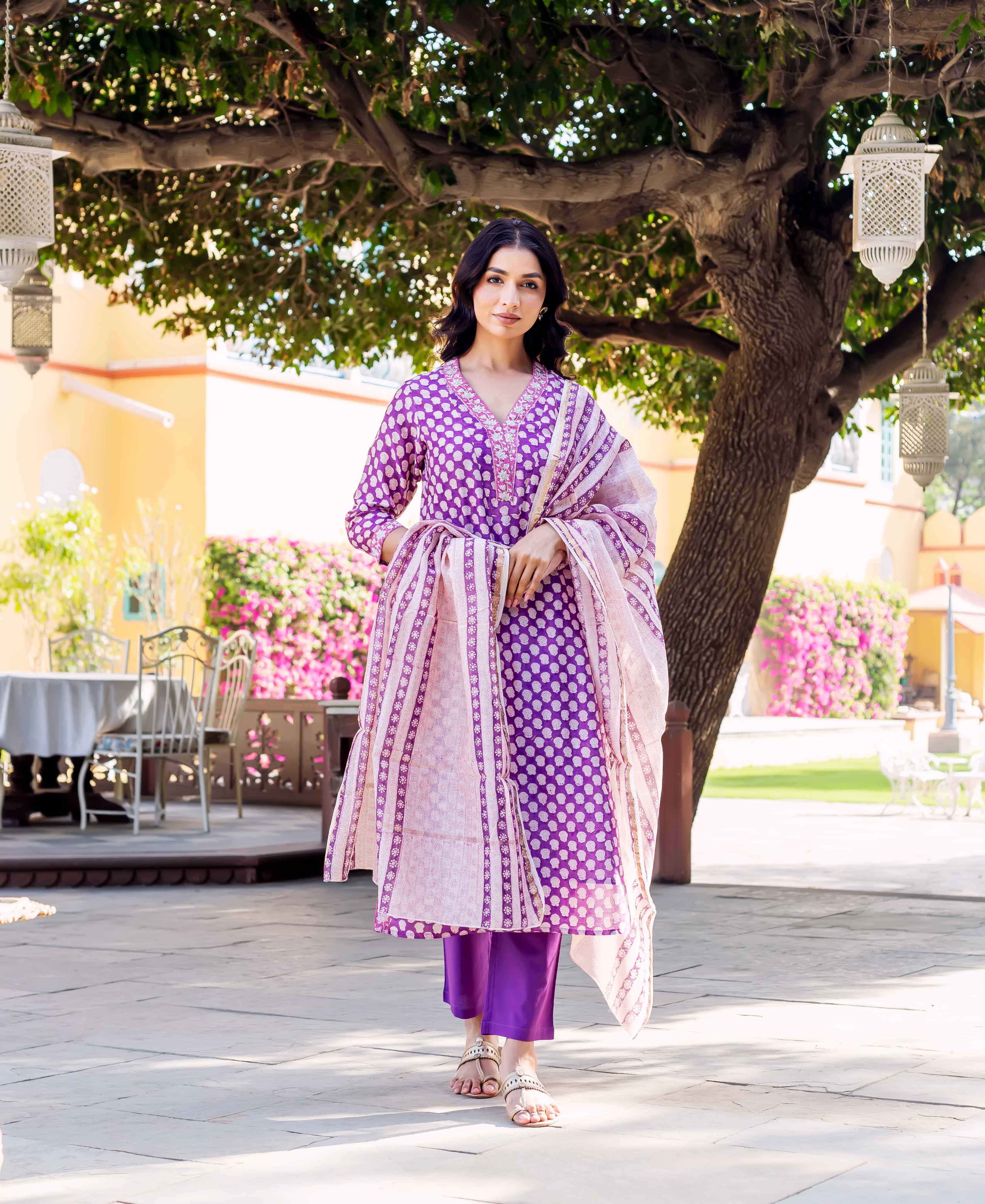 Purple and white hand-block-printed chanderi kurta with white patterned dupatta and purple pants.
