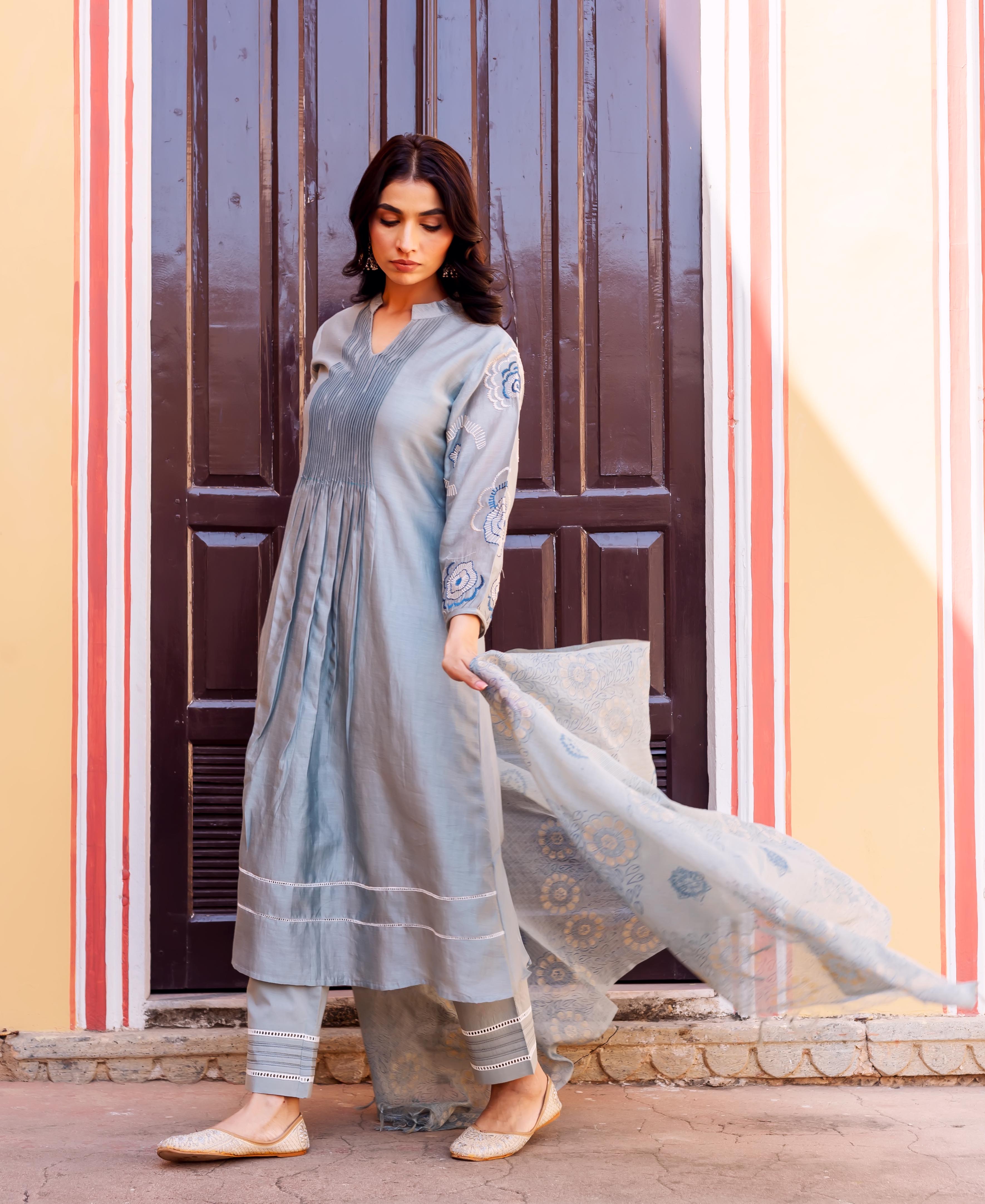 Model in slate blue Chanderi silk kurta, embroidered sleeves, and hand-block printed dupatta.