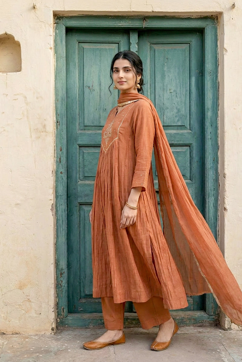 Rust Embroidered Mal Silk Chanderi Kurta Set with Pants & Dupatta — model front