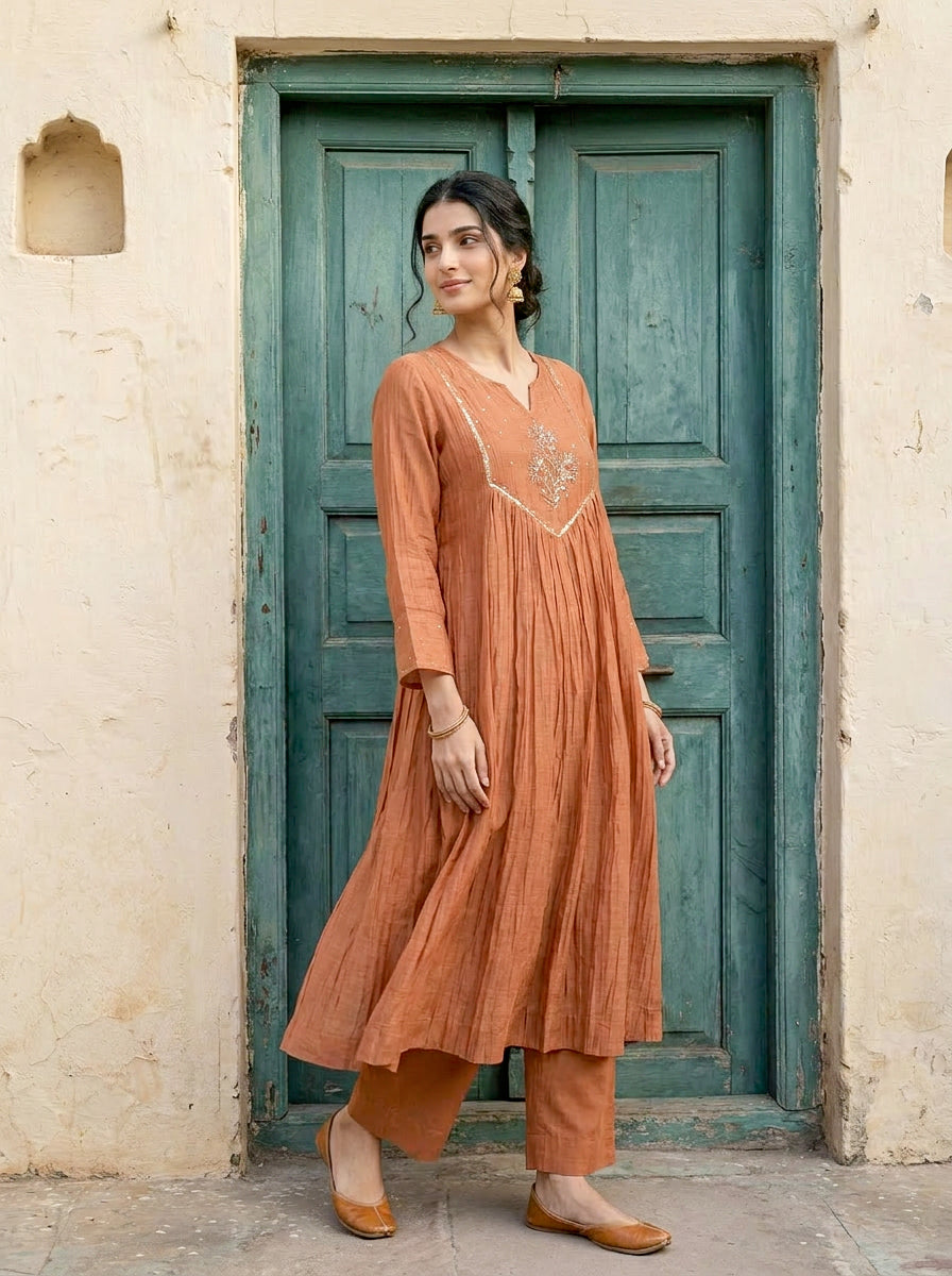 Rust Embroidered Mal Silk Chanderi Kurta Set with Pants & Dupatta — fabric close-up