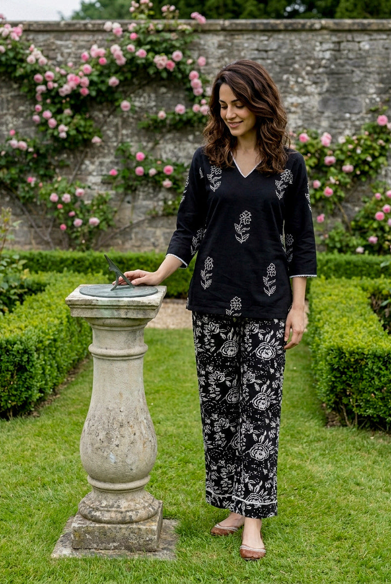 Black and ivory handblock printed cotton cord set on model, full view.