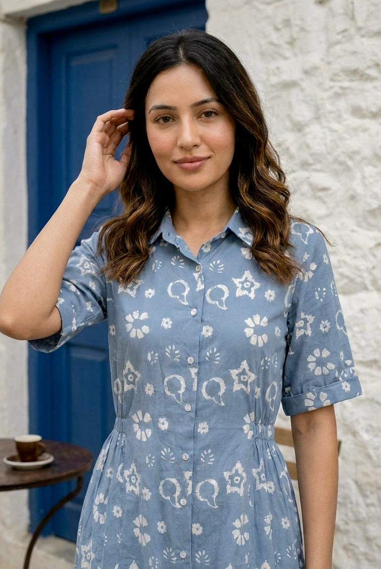 Front view of woman in blue handblock printed cotton collared dress with short sleeves.