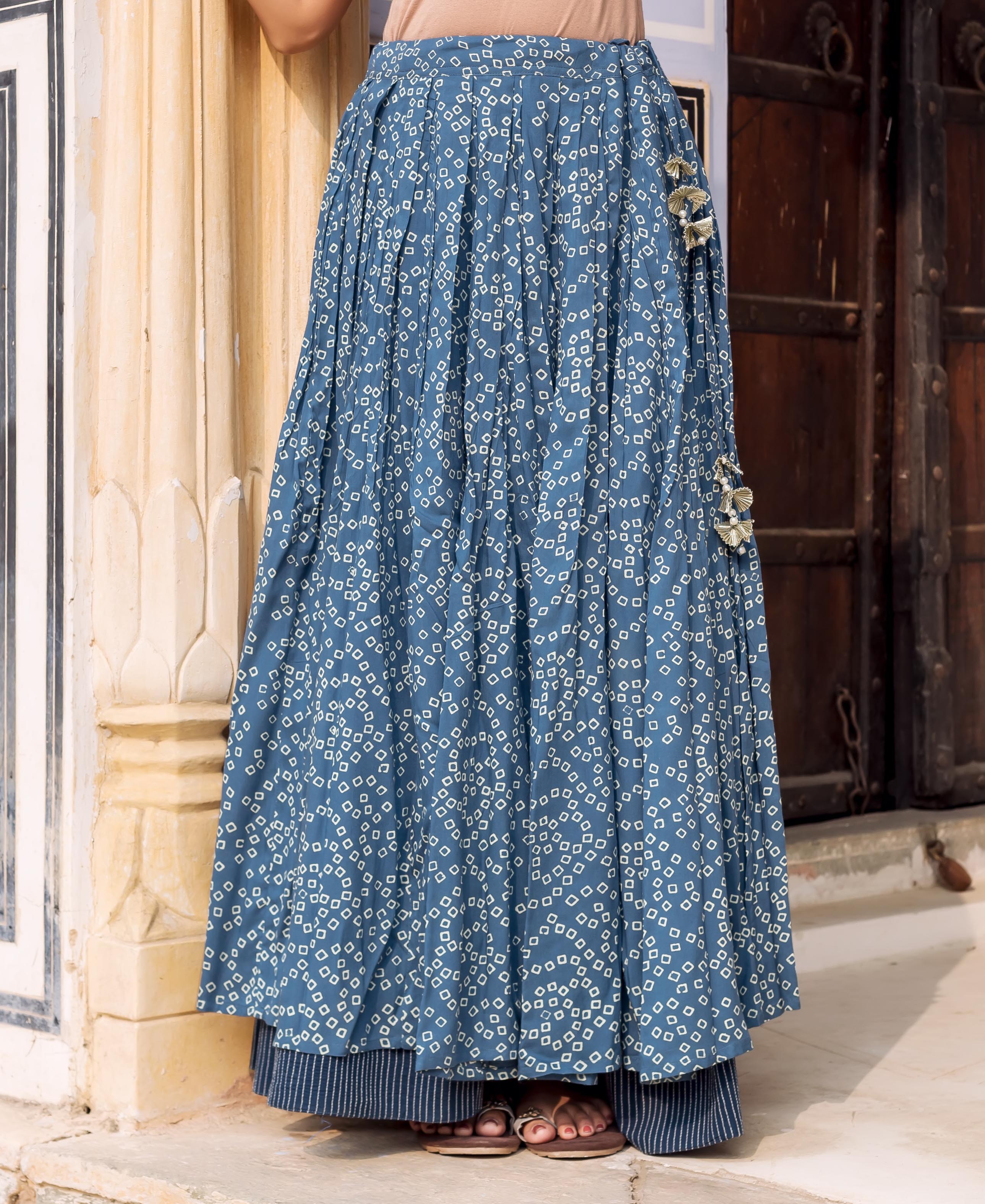 Full length indigo blue double-layered skirt with white square print and metallic floral side embellishments.