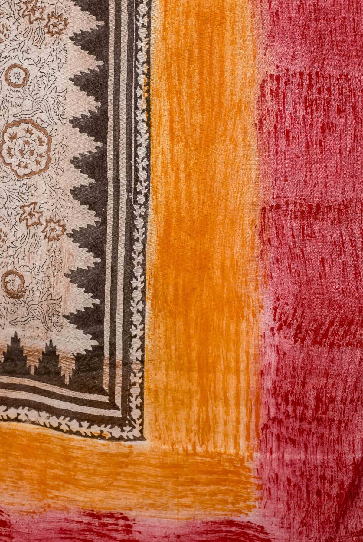 Draped red and orange hand-block printed dupatta featuring cream floral and ethnic patterns.