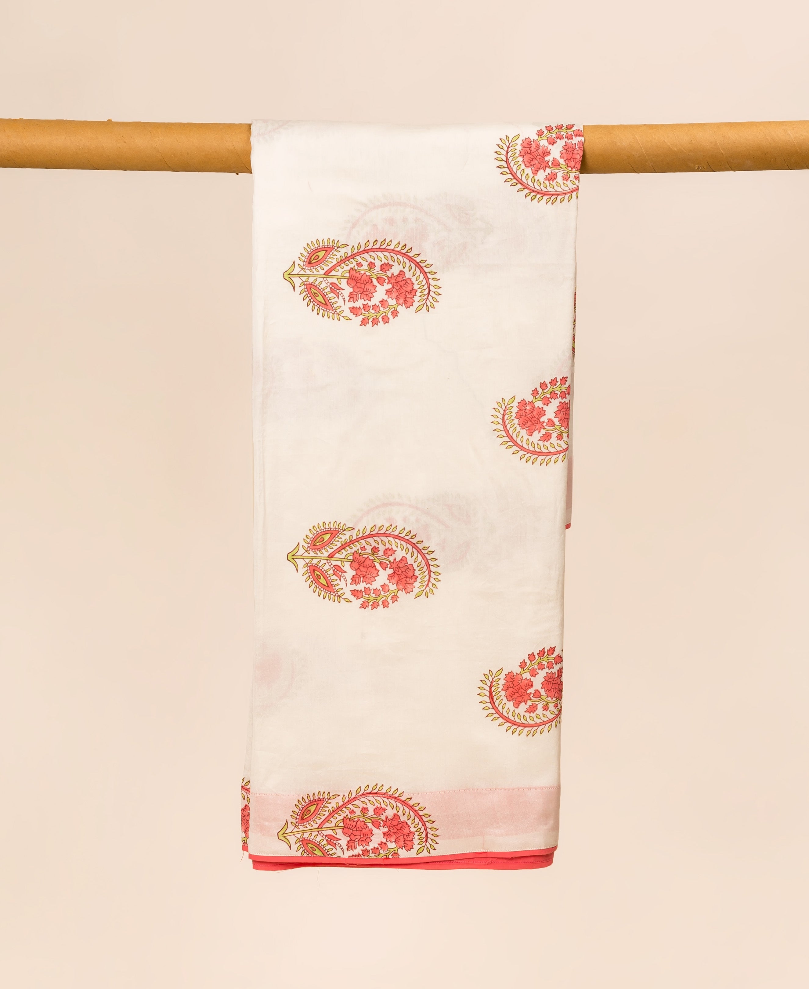 White hand block printed dupatta with coral floral paisley motifs and red border.