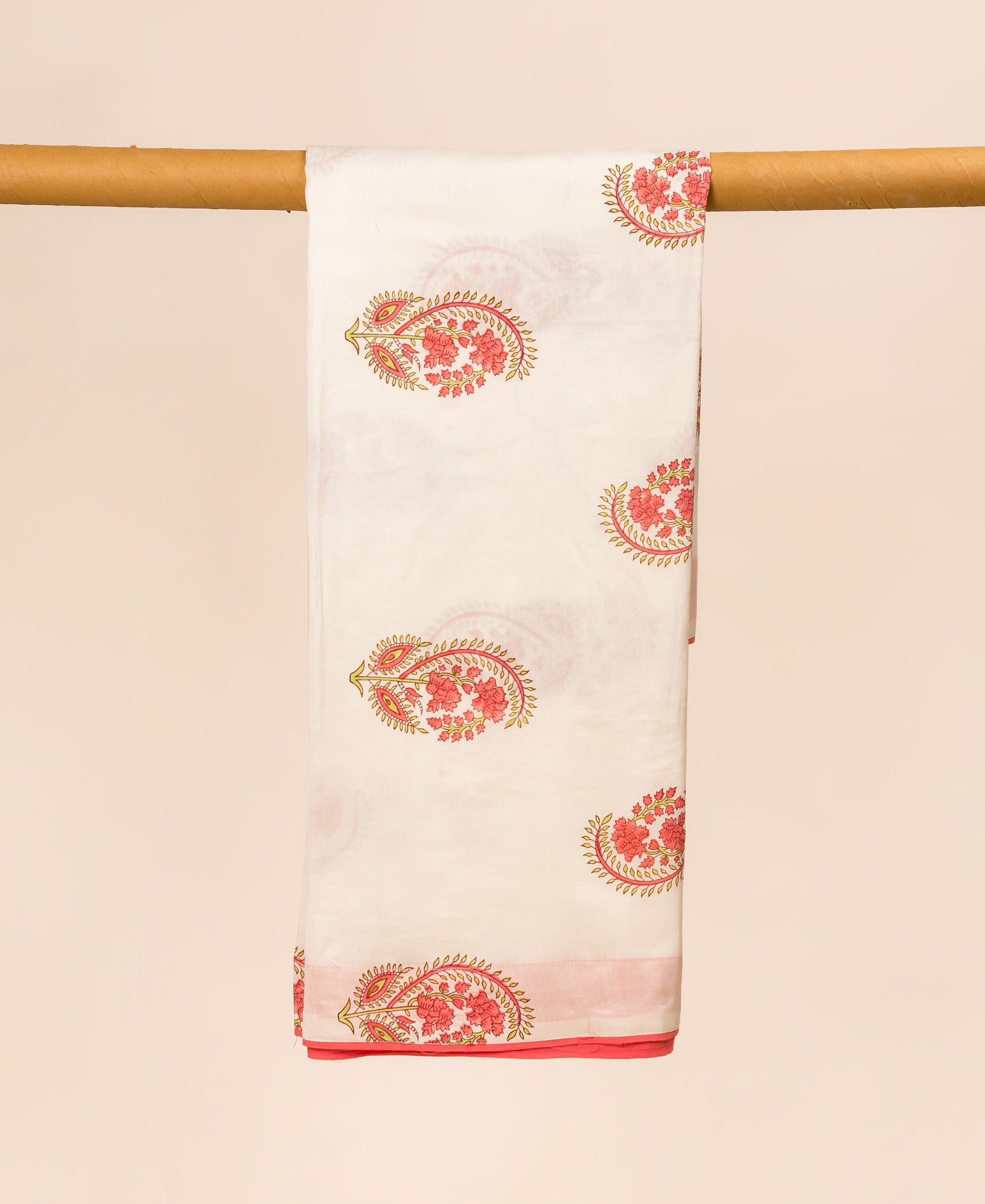 White hand block printed dupatta with coral floral paisley motifs and red border.
