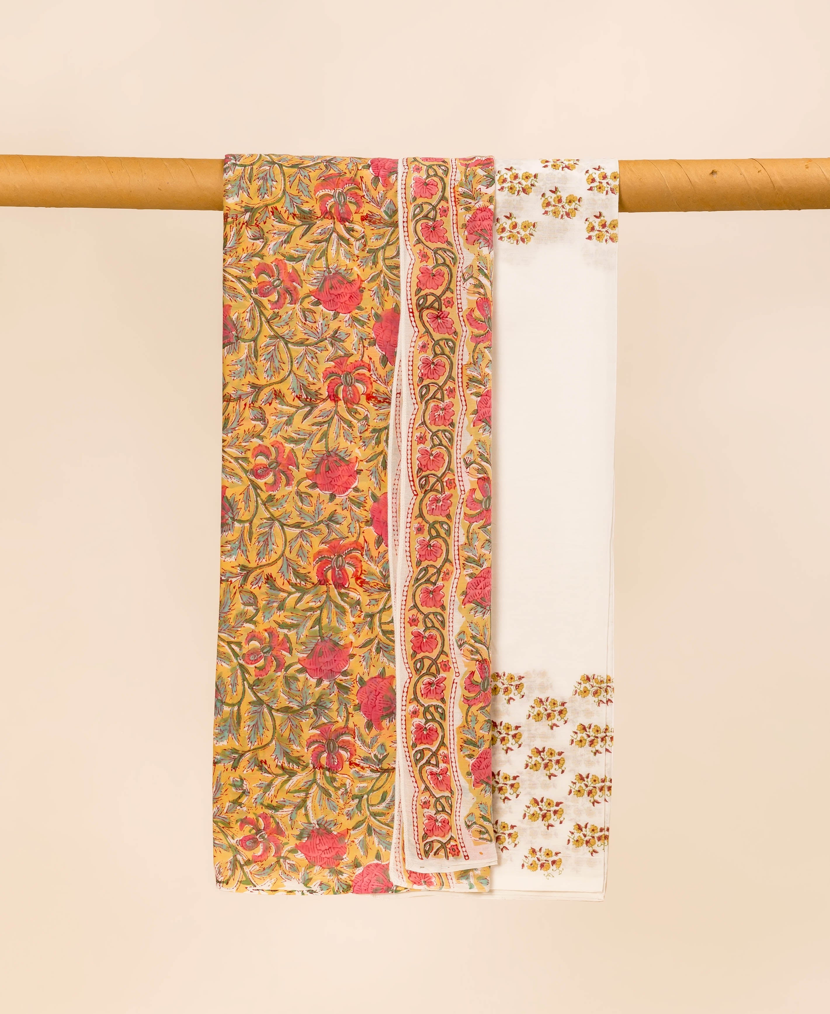 Vibrant yellow and white hand-block-printed dupatta with pink, orange, green floral motifs and borders.