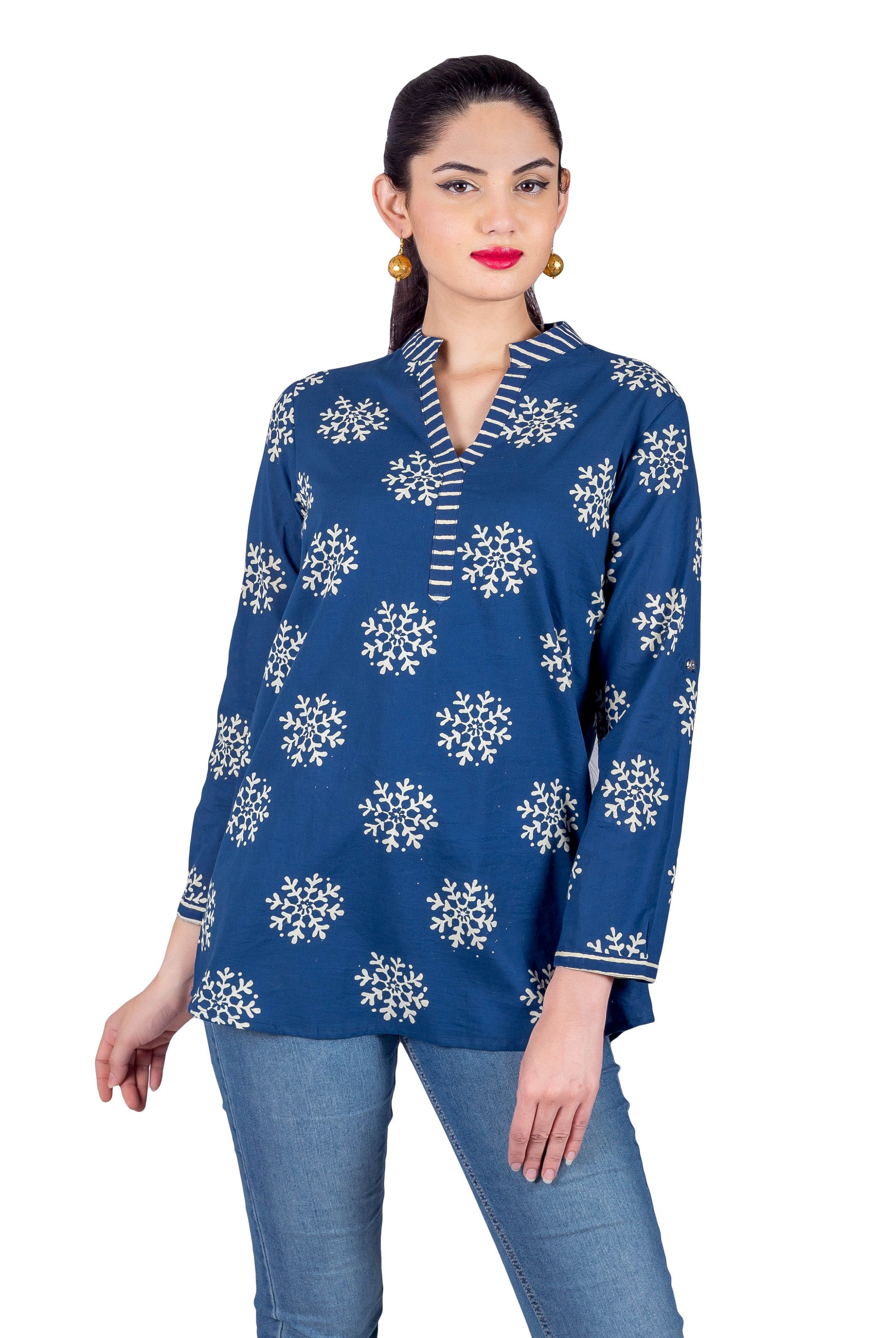 Model wearing indigo blue ethnic short kurti with white snowflake buta print, full look front.