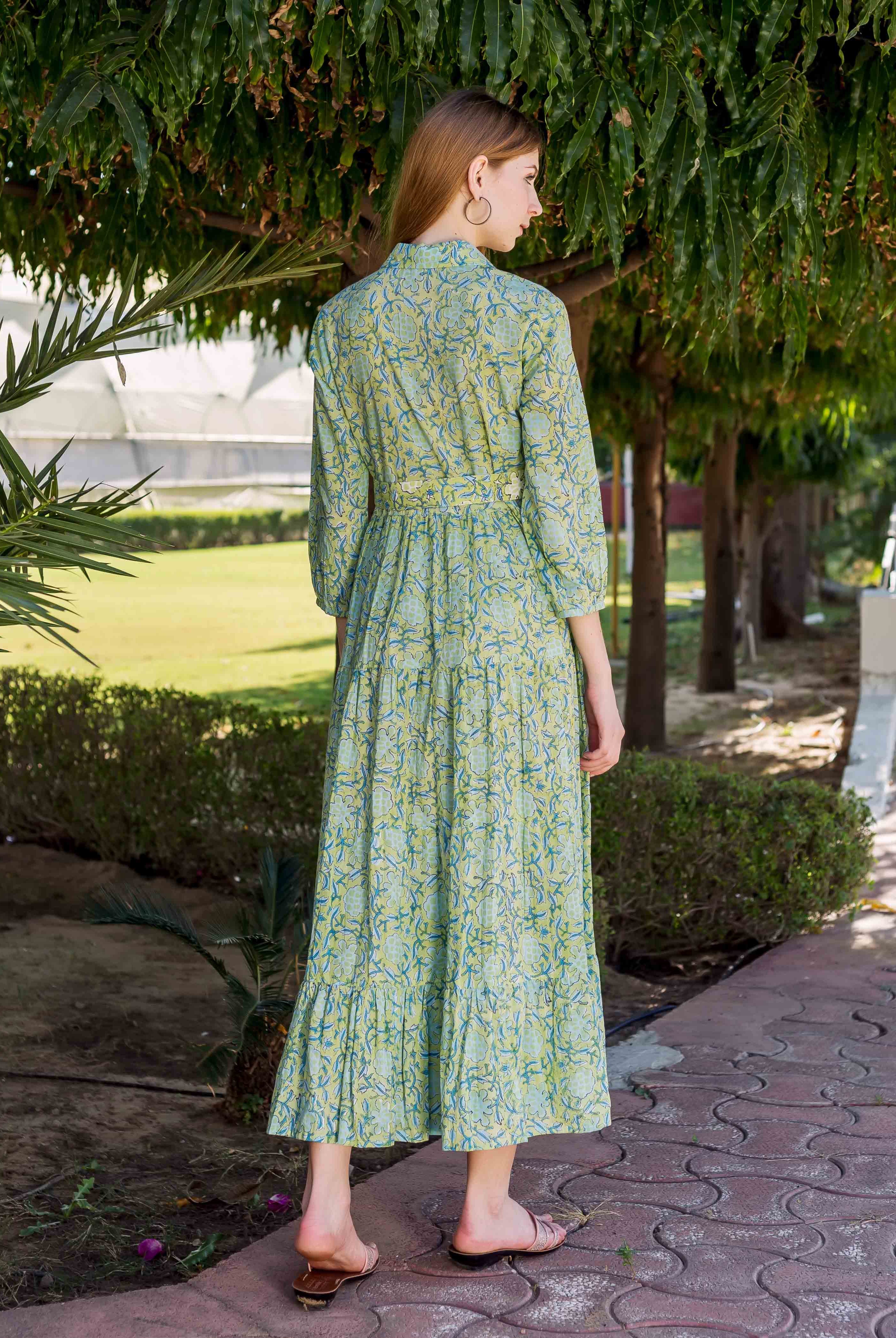 Rear view of model in a lime green hand-block-printed shirt collar maxi dress.