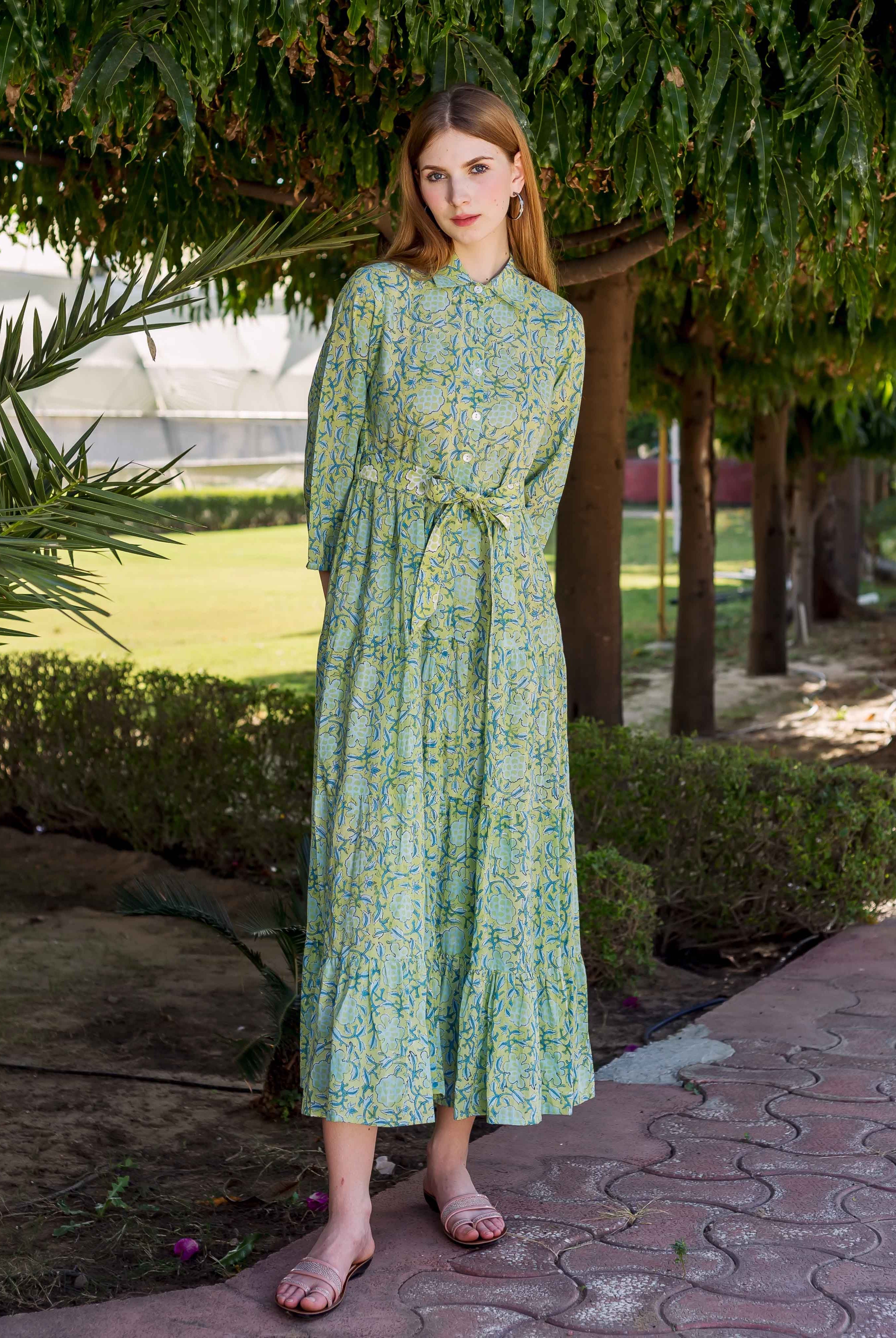 Full-length model in a lime green hand-block-printed shirt collar dress with belt.